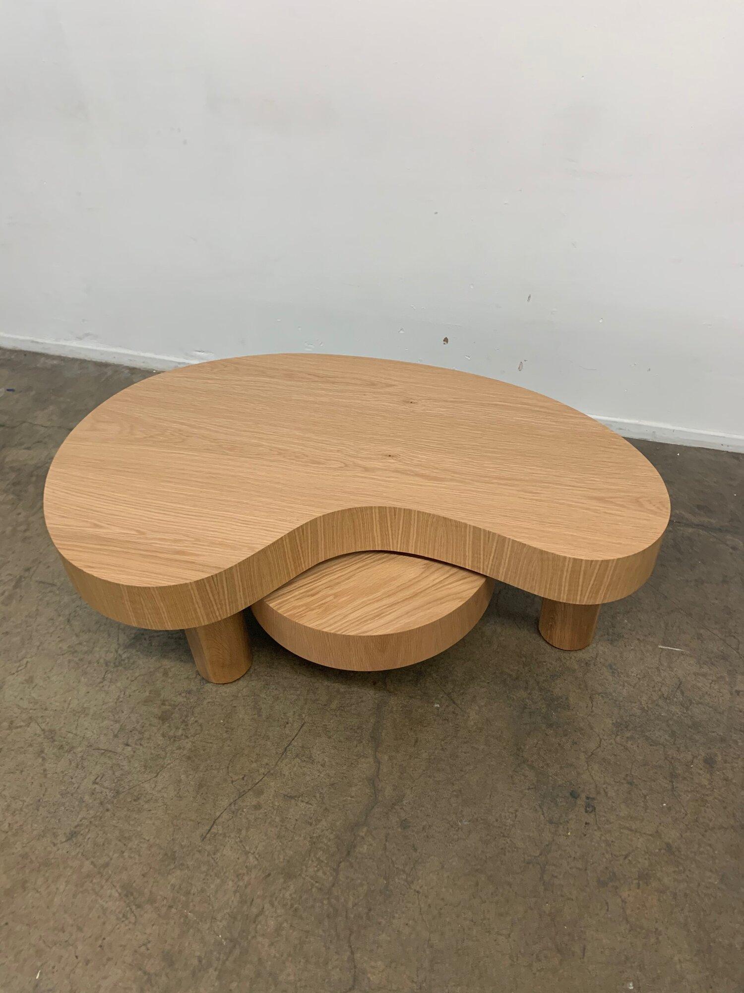 Medium version offered. 
Measures: Stool W 21.75 D 21.75 H 11.5
Handcrafted Kidney coffee table made in house by Vintage On Point. Made in solid wood framing and veneered wrapped white oak. Small side table can be pushed underneath larger table or