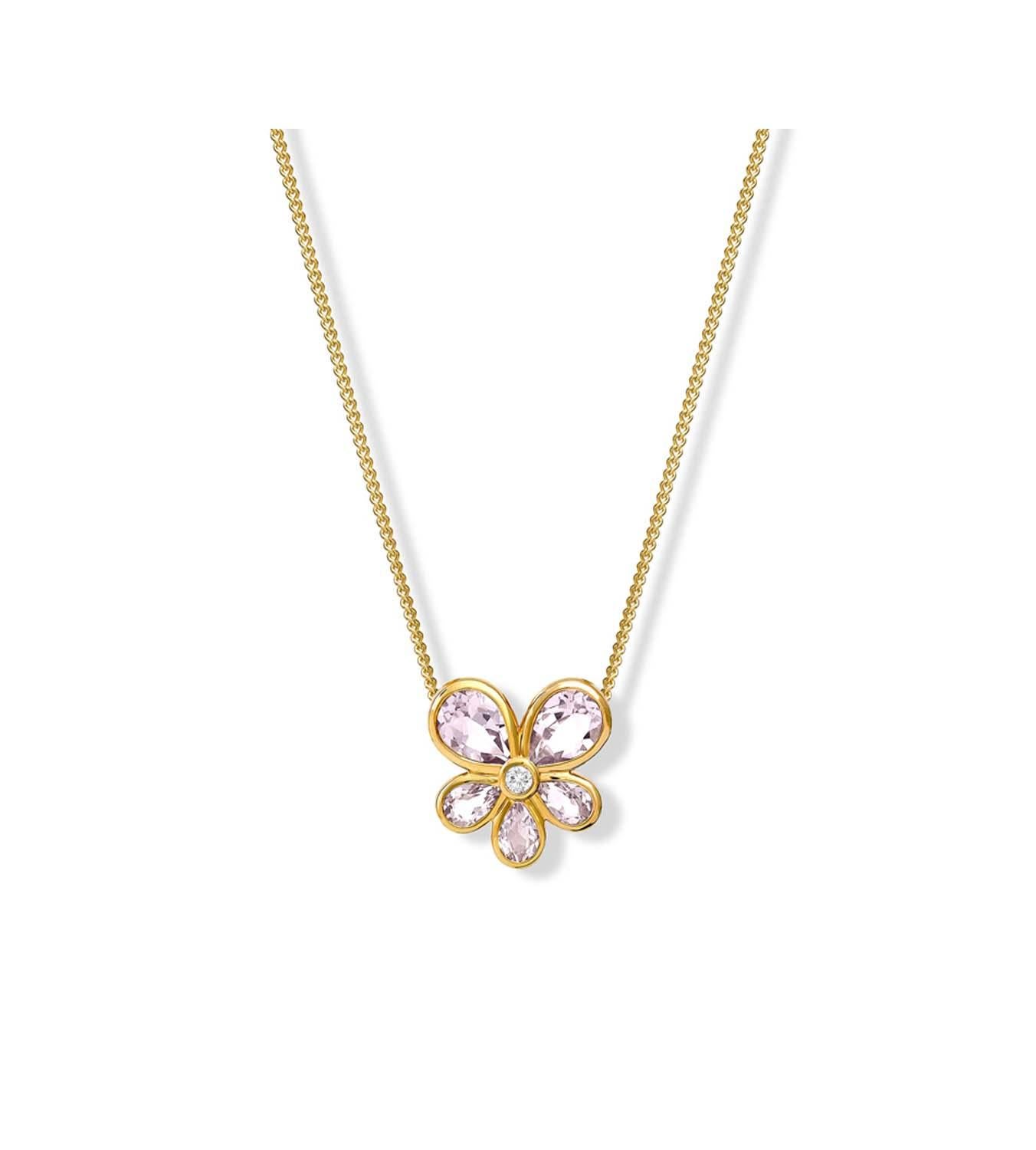 Medium Viola necklace pendant in 9 carat yellow gold set with five facetted pale soft pink amethyst and a central diamond. Inspired on the native Viola (wild pansy) flowers of Sicily. Viola is the flower that symbolises remembrance. From Cassandra's