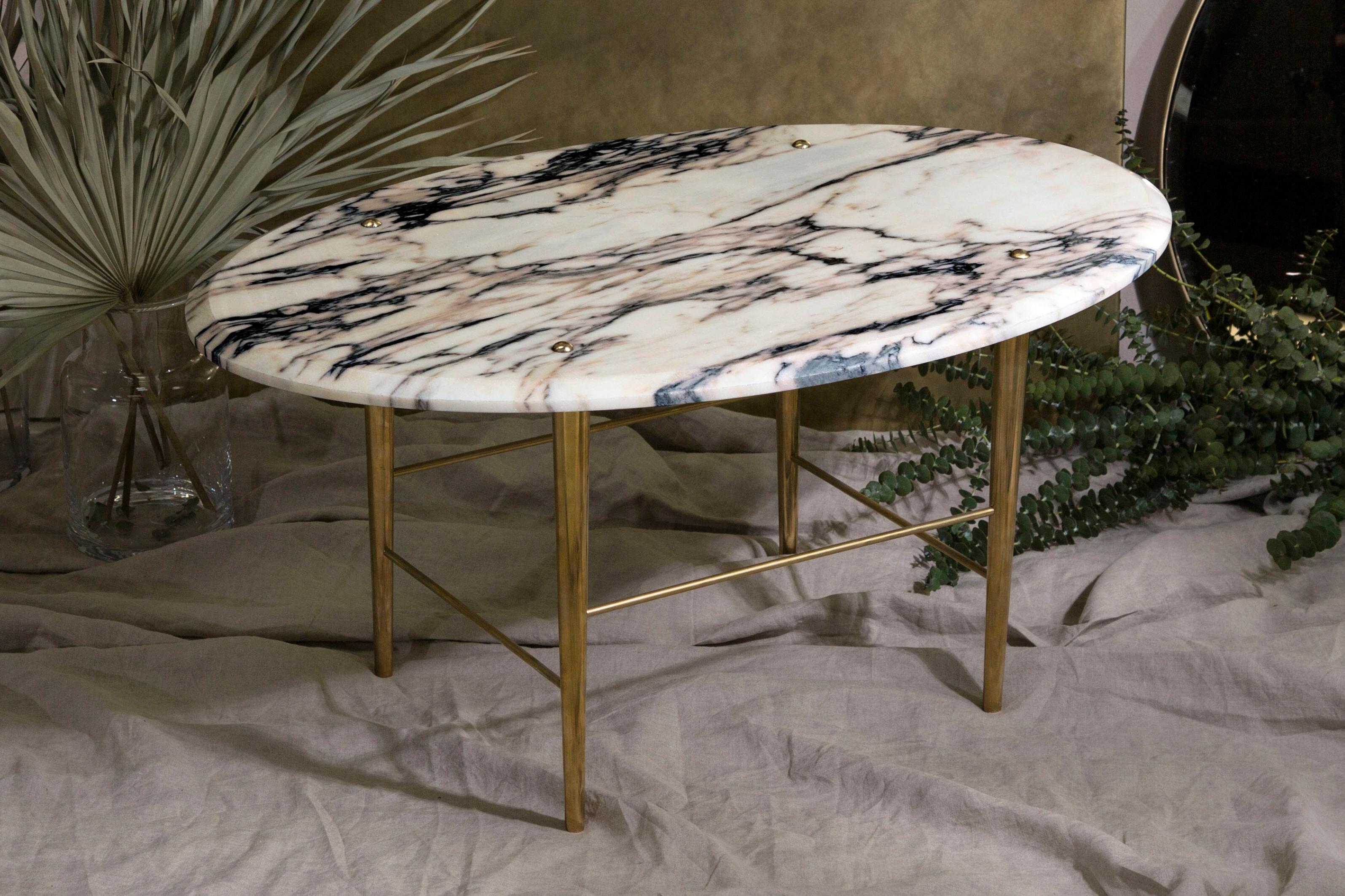 Medium Vulcanatta Stud coffee table by Lind + Almond
Handcrafted
Dimensions: 100 L x 64 W x 40 H
Materials: marble, brass.

A coffee table in Portuguese marble and polished brass. Hand crafted to order in Northern England. Bespoke sizes and