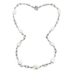 Collar largo de una sola vuelta con perla barroca blanca mediana en plata de ley