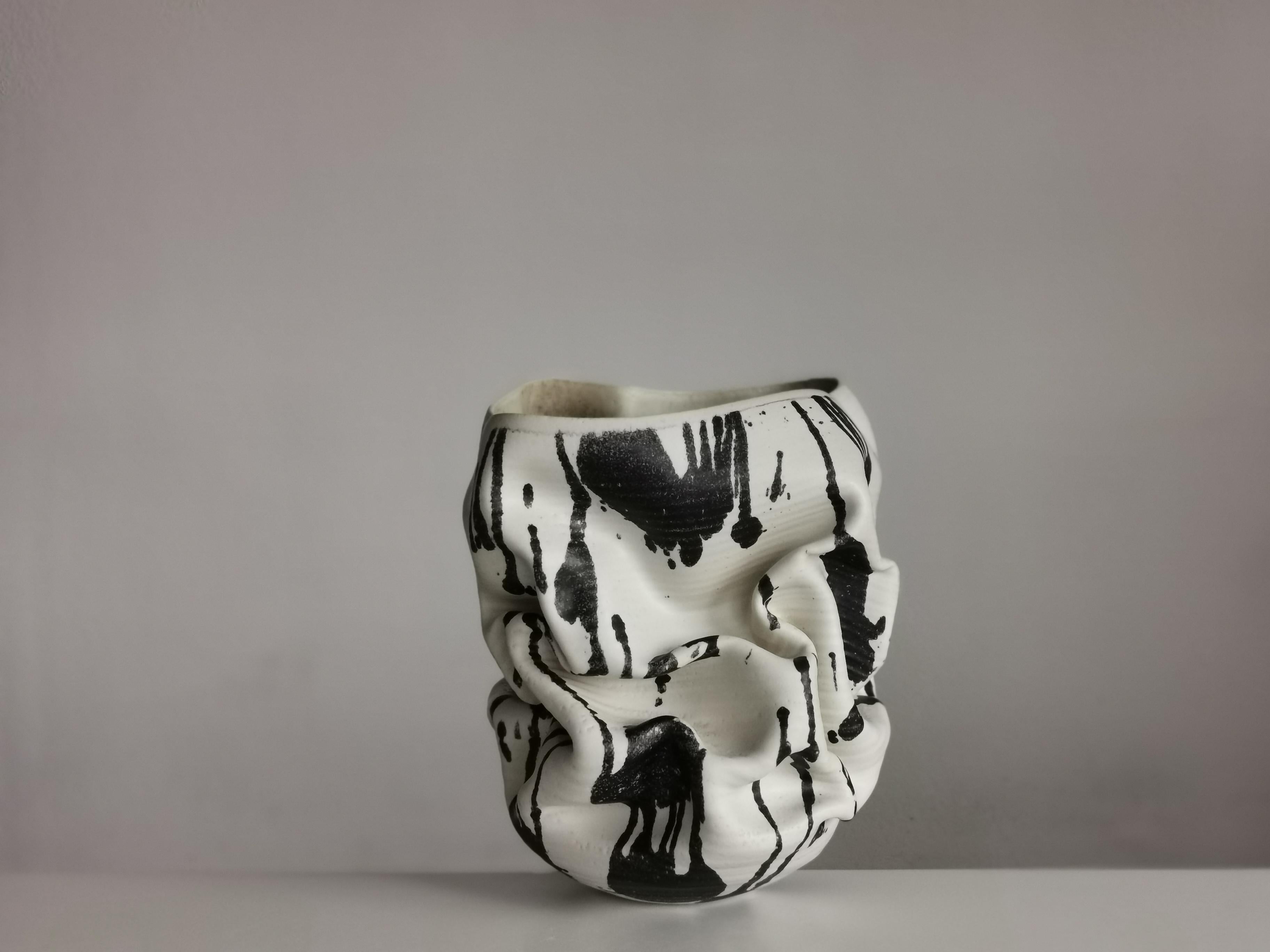Sumptuous ceramic vessel from ceramic artist Nicholas Arroyave-Portela. Made in 2021.

Materials: White St.Thomas clay, Stoneware glazes, multi fired to cone 9 (1260 degrees)
Dimensions: 31 cm tall, 27 cm wide, 27 cm deep
Weight: 3.5 Kg

The artist