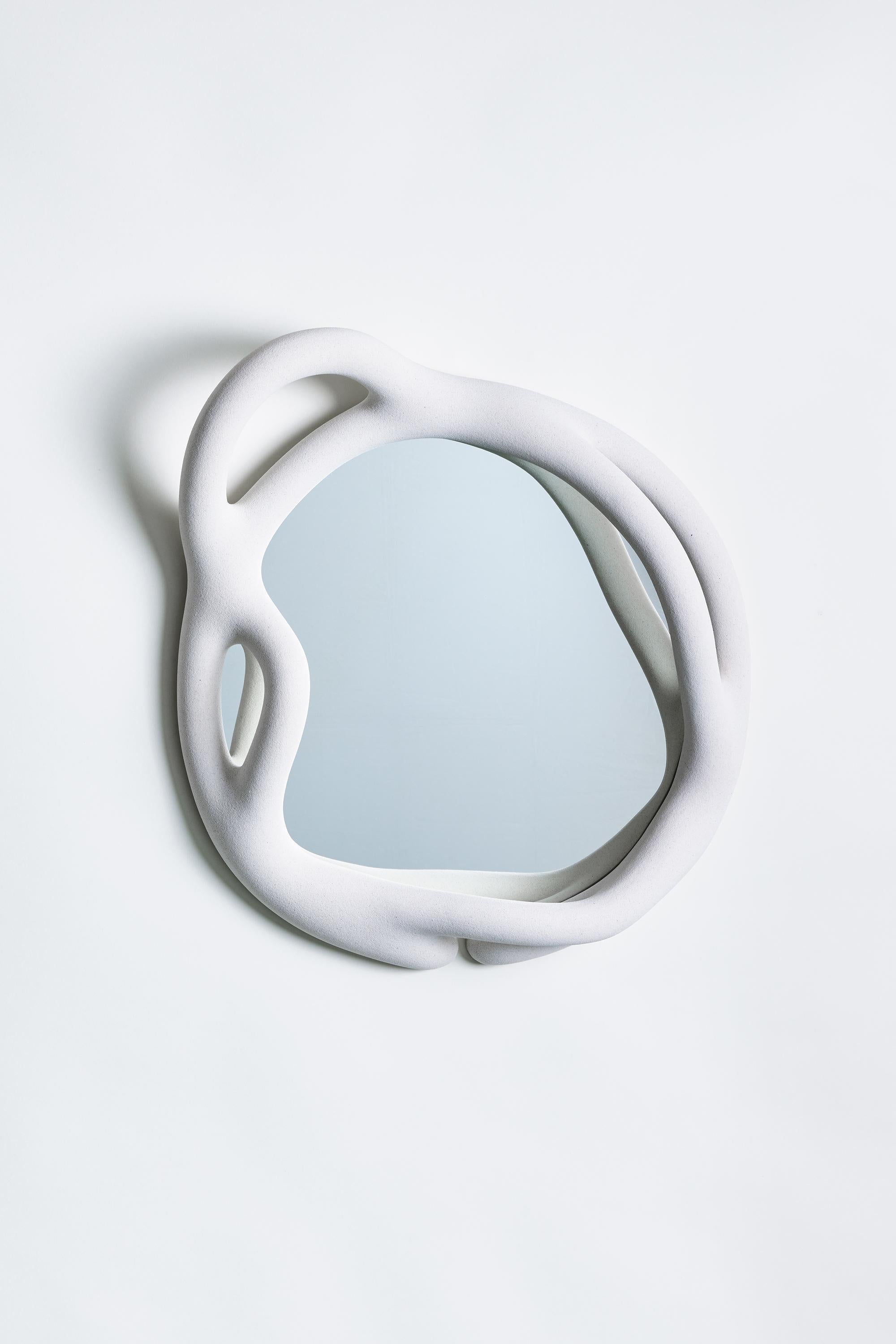 Medium White Portal Mirror by Hot Wire Extensions
Materials: Waste nylon powder, locally sourced natural white marble sand, copper pipe, mirror.
Dimensions: D 12.5 x W 61 x H 60 cm 
9 kg
Different dimensions, shapes, and colors upon request.

Hot