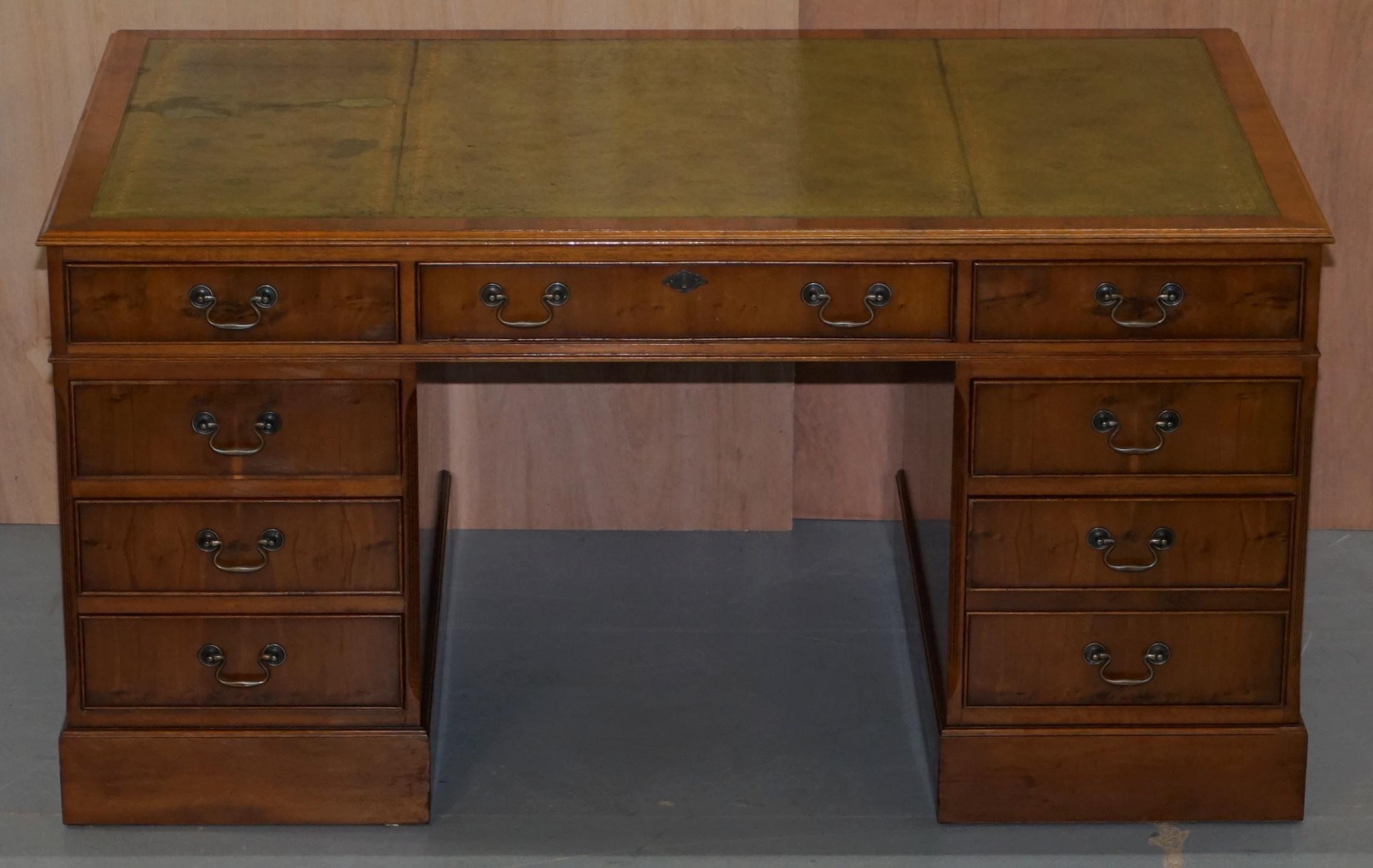 We are delighted to offer for sale this vintage twin pedestal partner desk finished in luxury burl yew wood with a green leather gold leaf embossed top

A very good looking and well made desk with a lovely timber patina, its vintage and used, the