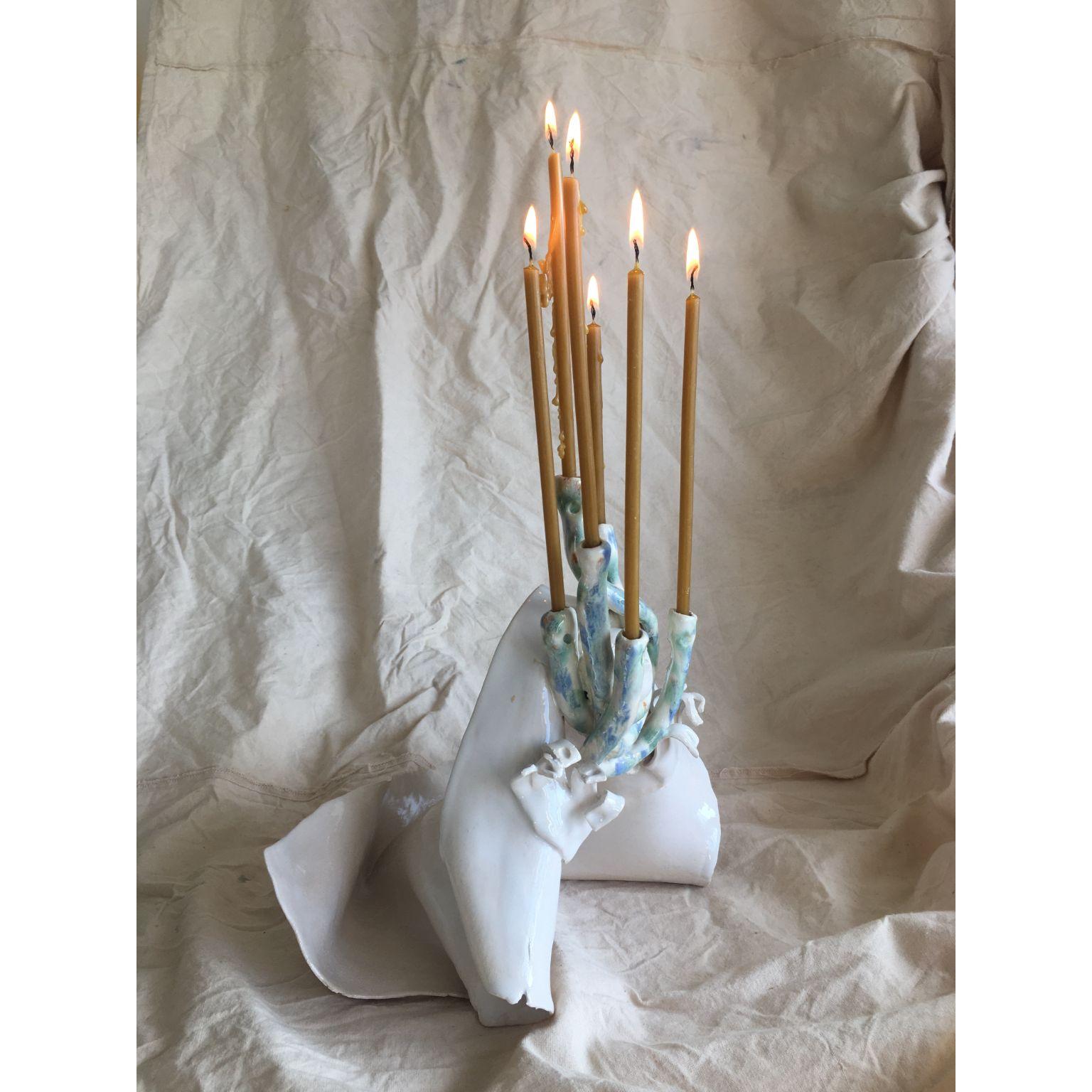 Medusa candle holder by Ana Botezatu.
Dimensions: D 25 x W 19 x H 23.5 cm.
Materials: tin glazed earthenware.

Ana Botezatu (b. 1982, Bra?ov (former Kronstadt), Romania) lives and works in Berlin. She works with ceramics, drawing, book