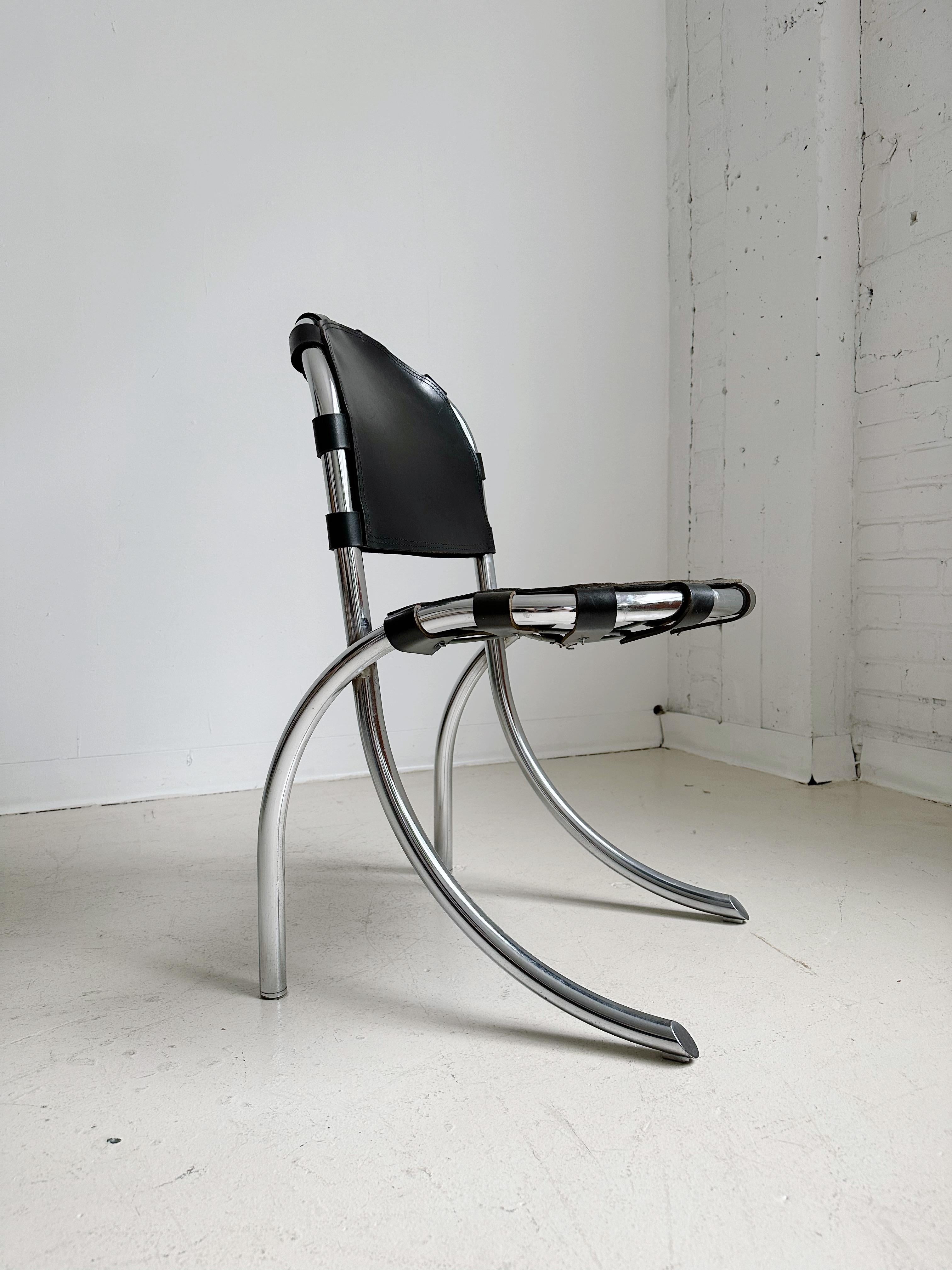 Medusa Dining Chairs by Studio Tetrarch for Alberto Bazzani, Set of 4, 60's

Features a curved chrome frame and thick black leather seat & back

//

Dimensions:
18”W x 20”D x 32”H  each

18.5” seat height

Sold as a set

//

*Very good condition,