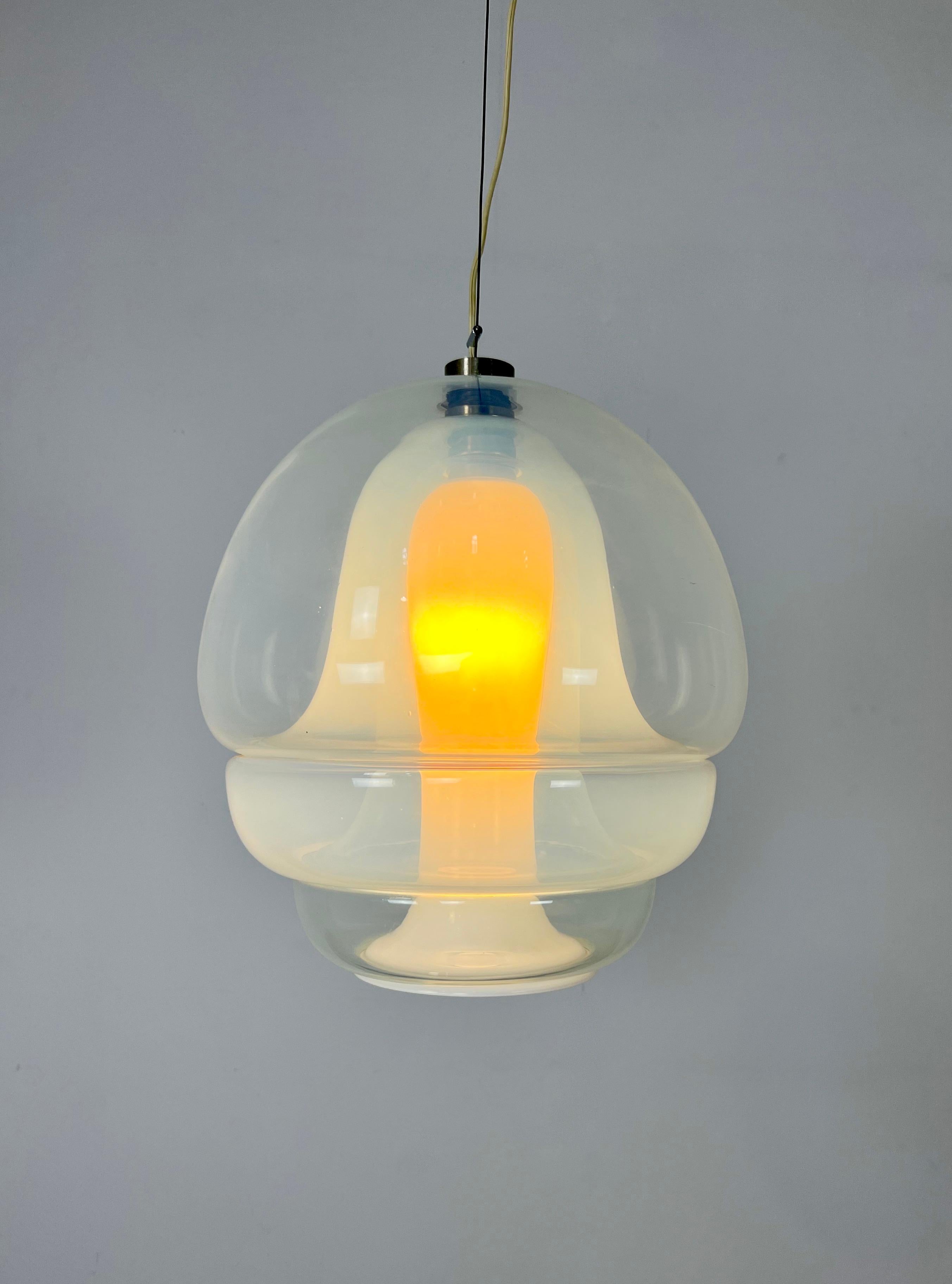 Floor lamp in transparent glass. Adjustable height. Wear due to time and age of the chandelier.