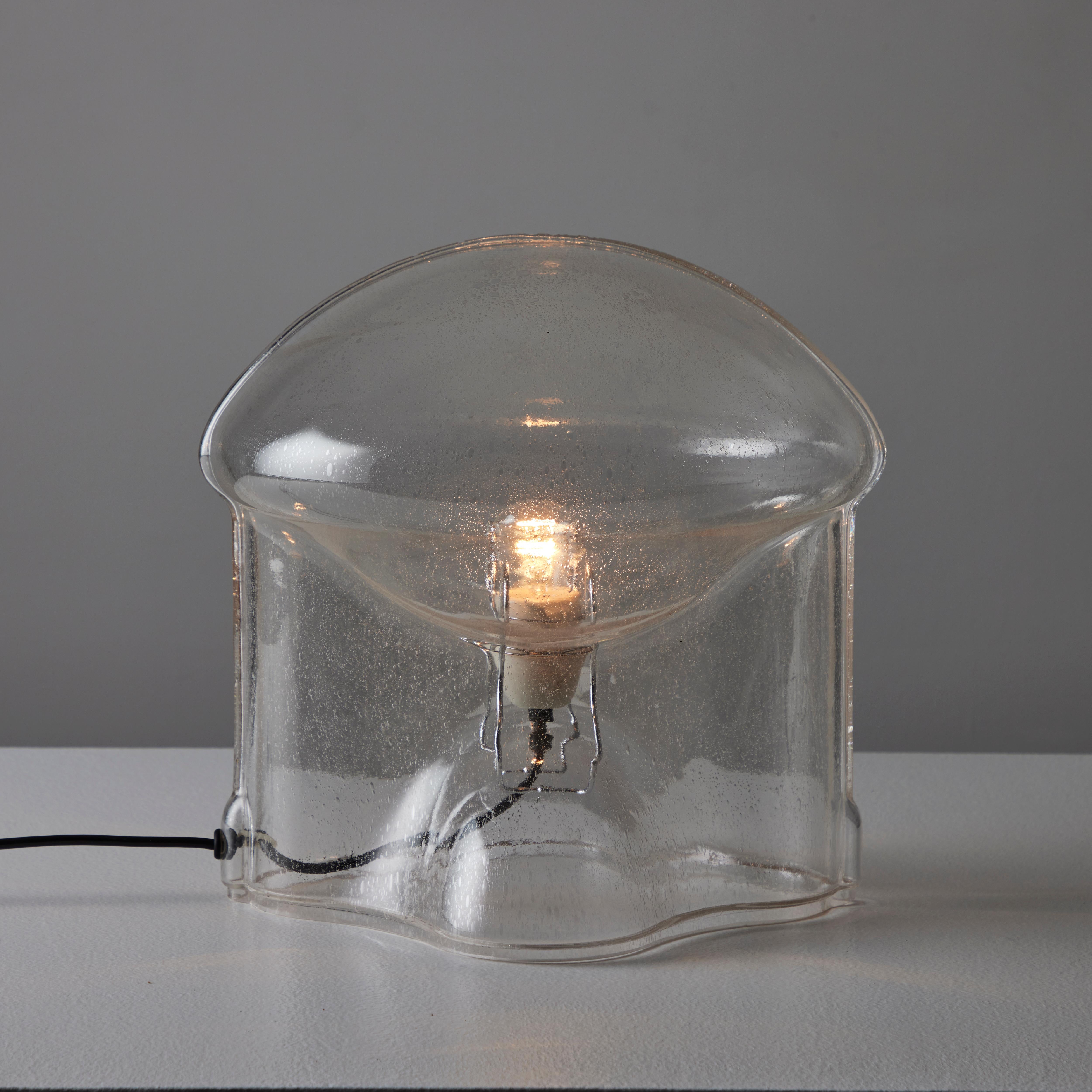 'Medusa' Table Lamp by Umberto Riva for VeArt. Designed and manufactured in Italy, in 1972. An anatomical molded clear glass table lamp. The clear glass is one piece and works alongside a spring operated socket holder. The lamping consists of a