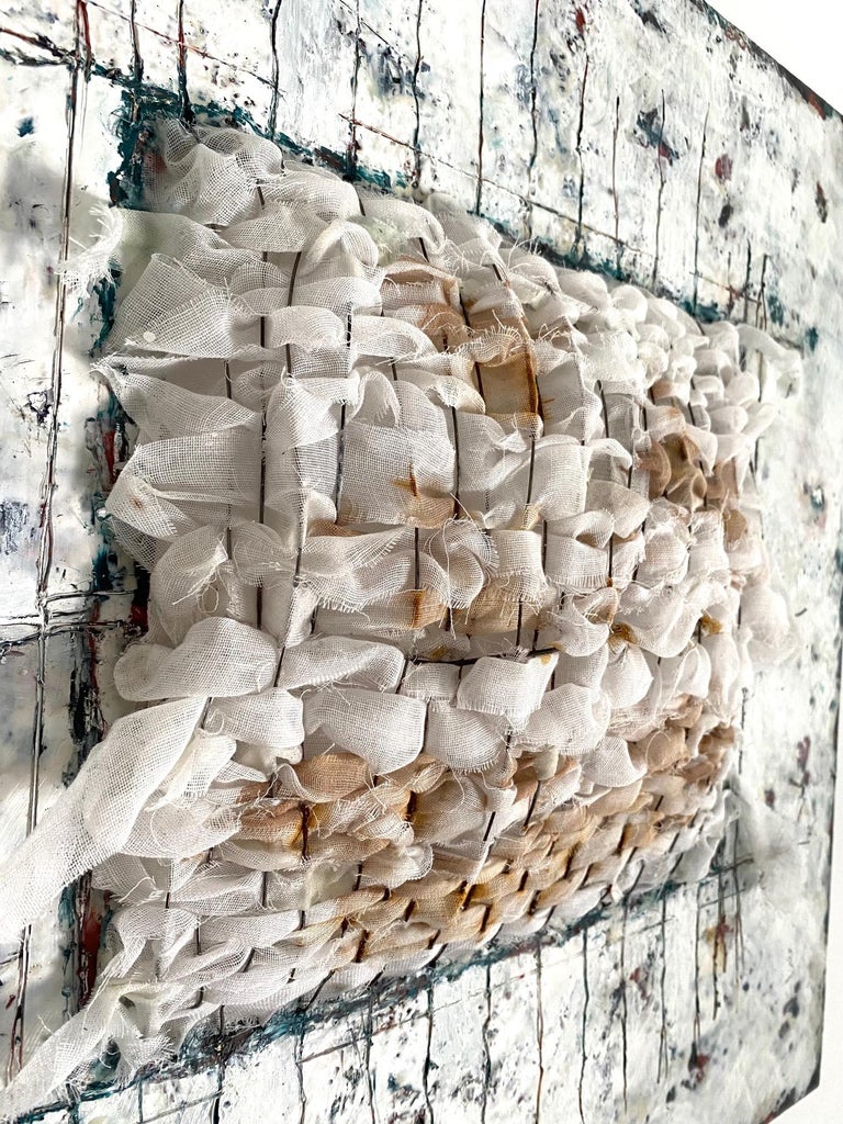 Klim’s mixed media work juxtaposes several materials on one picture plane highlighting their inherent qualities to create surface tension.  A physical presence is apparent in her pieces from textured encaustic and paper surfaces to grid like