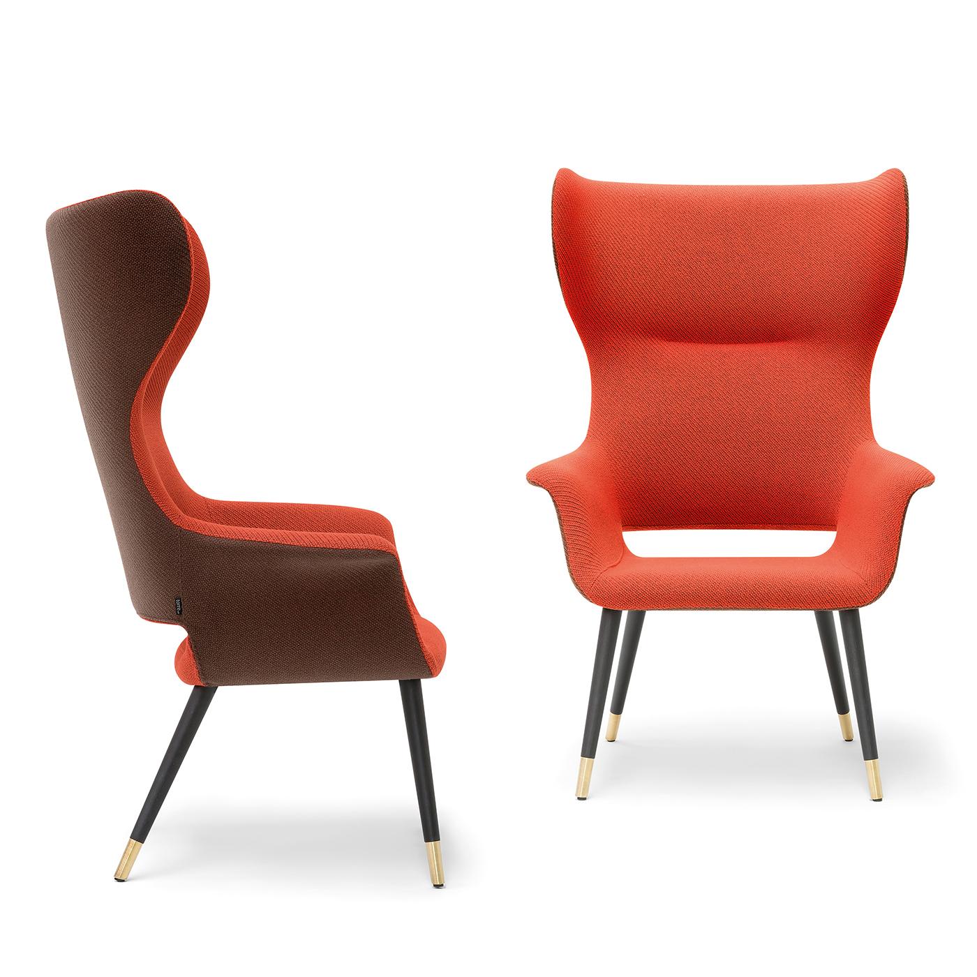 An exploration of the essence of forms, this timeless bergère armchair designed by Carlesi & Tonelli will add a sophisticated touch to any room. Characterized by a welcoming, sinuous silhouette entirely padded with polyurethane foam, it rests on a