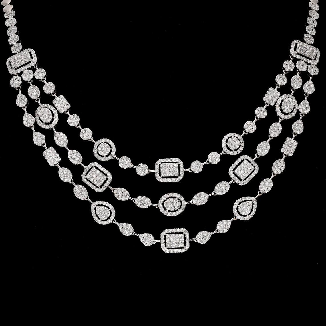 Crafted from 18-karat gold, this stunning necklace is meticulously hand-set with 11.81 carats of glistening diamonds.

FOLLOW MEGHNA JEWELS storefront to view the latest collection & exclusive pieces. Meghna Jewels is proudly rated as a Top Seller