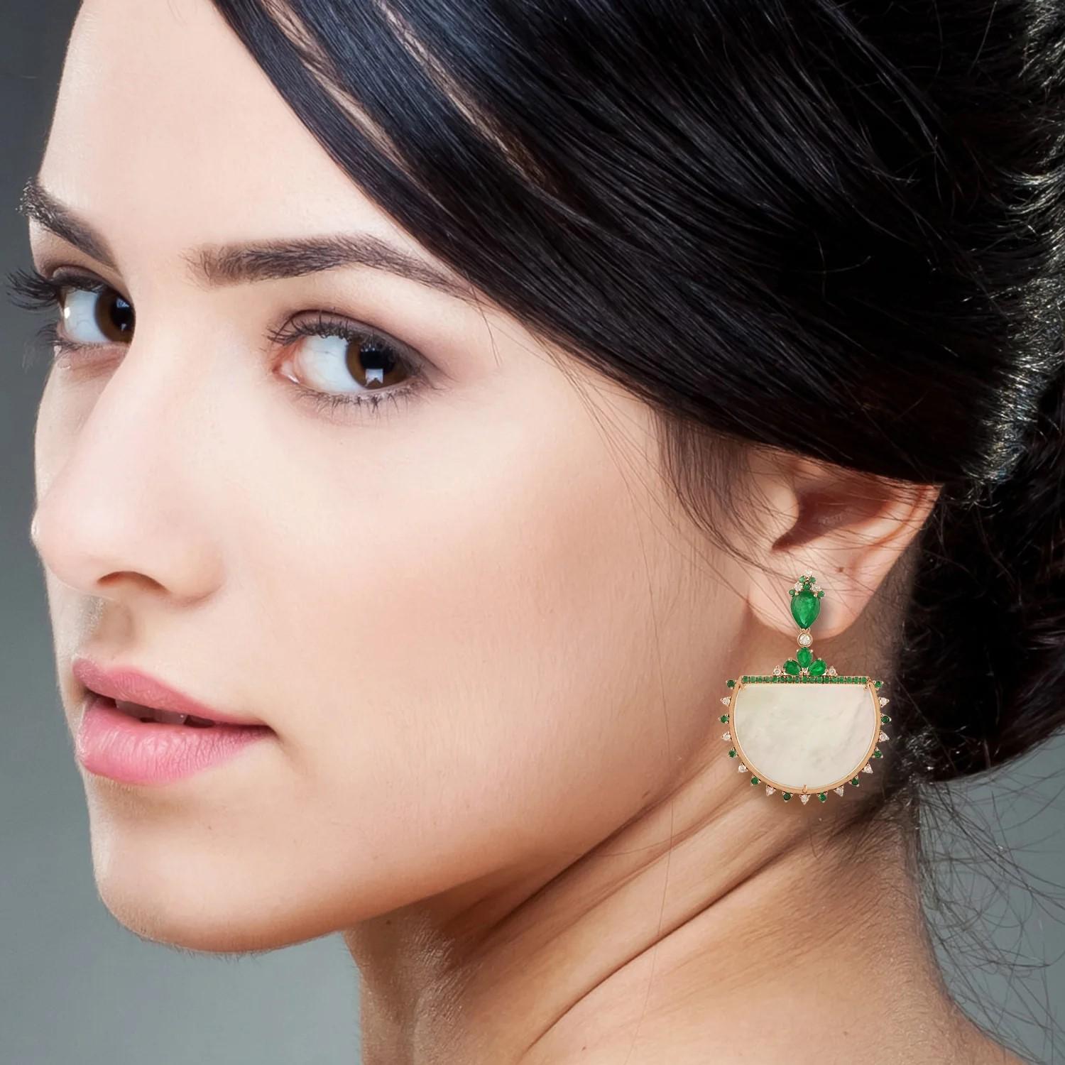 Cast from 14-karat gold, these stunning earrings are hand set with 3.67 carats Emerald, 23.12 carats mother of pearl and .54 carats of glimmering diamonds. 

FOLLOW  MEGHNA JEWELS storefront to view the latest collection & exclusive pieces.  Meghna
