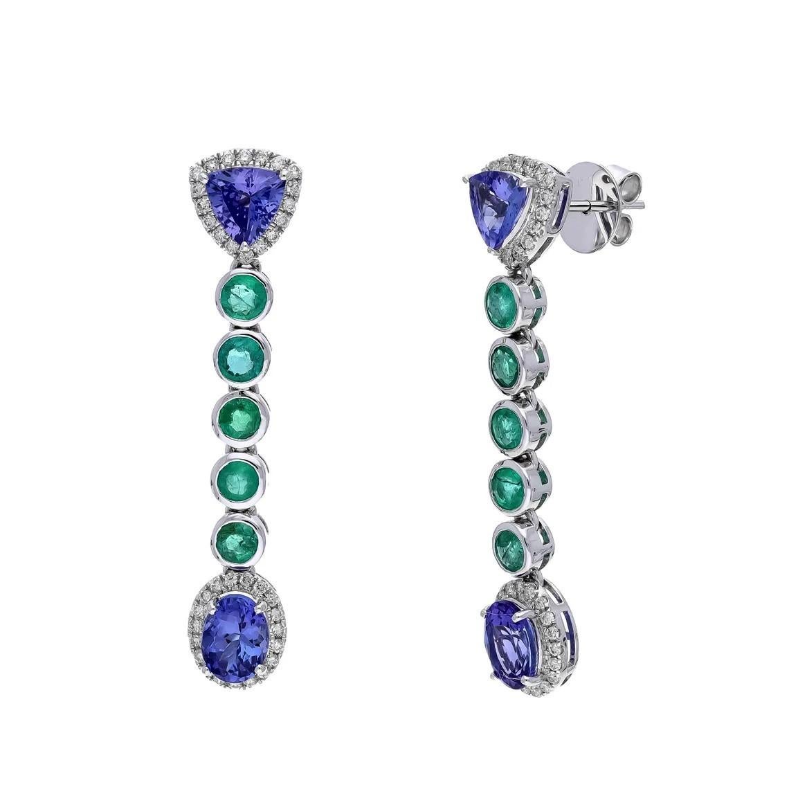 Cast in 18 karat gold. These earrings are handset in 3.20 carats tanzanite, 1.58 carats emerald and .44 carats of sparkling diamonds. 

FOLLOW MEGHNA JEWELS storefront to view the latest collection & exclusive pieces. Meghna Jewels is proudly rated