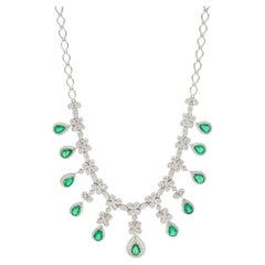 Meghna Jewels 6.98 Carat Emerald 6.29 carat Diamond 18 Karat White Gold Necklace