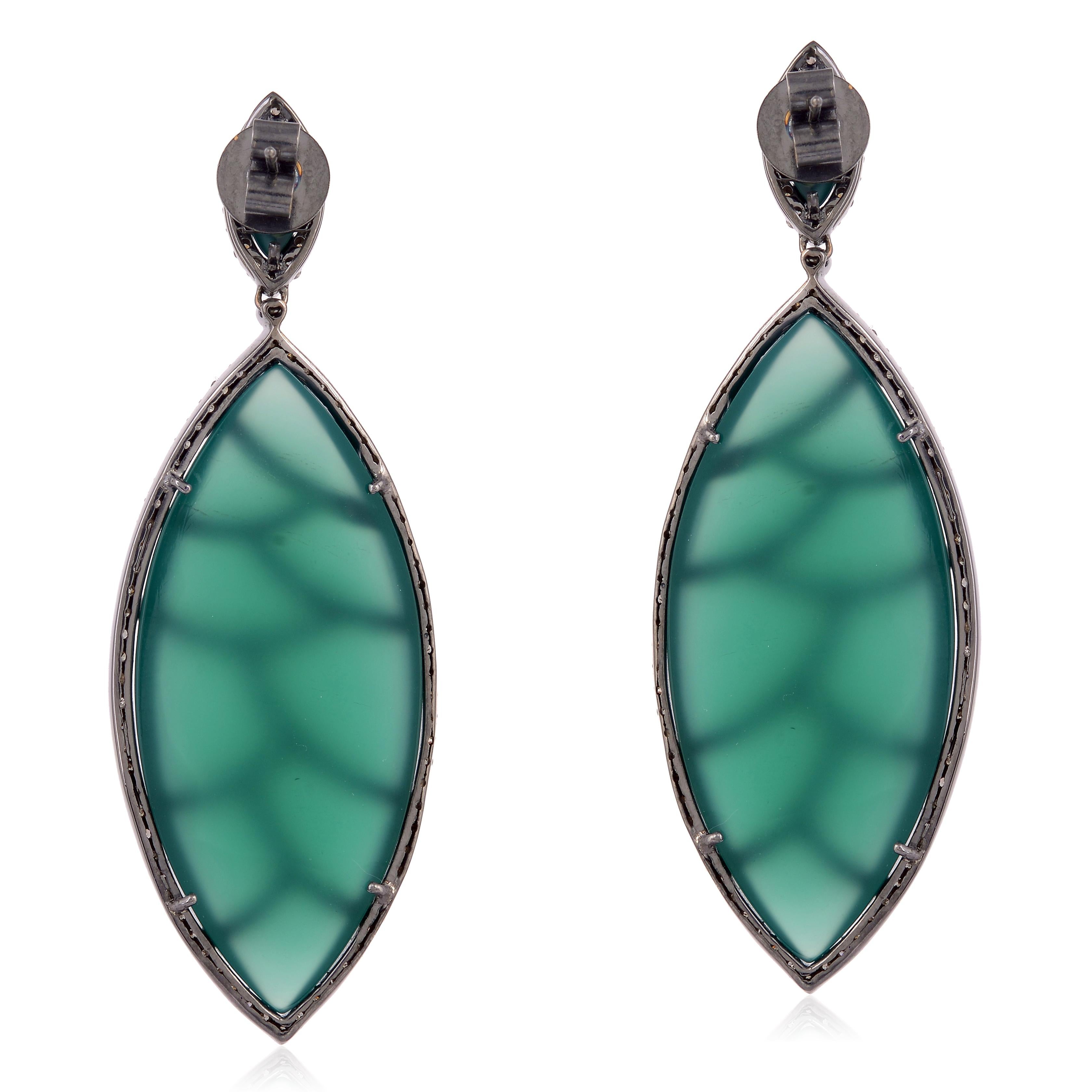 These Bora Bora earrings are cast in 18K gold and sterling silver. It is hand set in 71.25 carat green onyx and 4.45 carat of sparkling diamonds. Complimentary conversion to clip-on earrings is available.

FOLLOW MEGHNA JEWELS storefront to view the