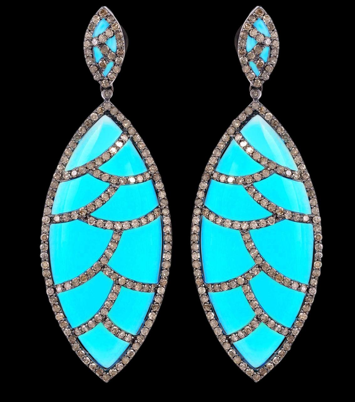 These Bora Bora earrings are cast in 18K gold and sterling silver.  It is hand set in 60.25 carat turquoise and 4.45 carat of sparkling diamonds. Complimentary conversion to clip-on earrings is available.

FOLLOW  MEGHNA JEWELS storefront to view