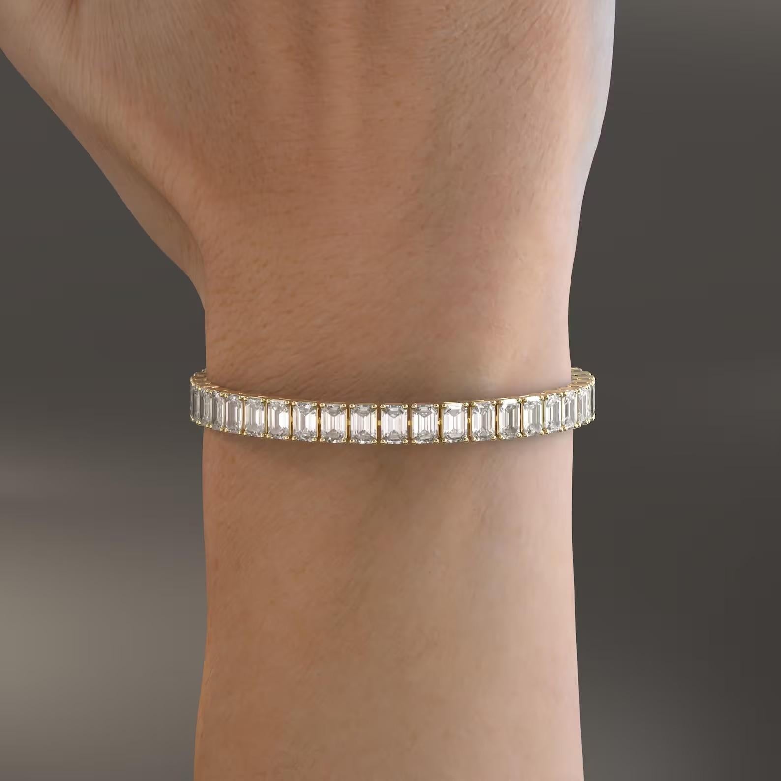 A stunning emerald cut diamond tennis bracelet handmade in 14K gold. It is set in 18.50 carats emeralds. Available in in 14K, 18K, White, Rose and Yellow Gold. 

FOLLOW  MEGHNA JEWELS storefront to view the latest collection & exclusive pieces. 