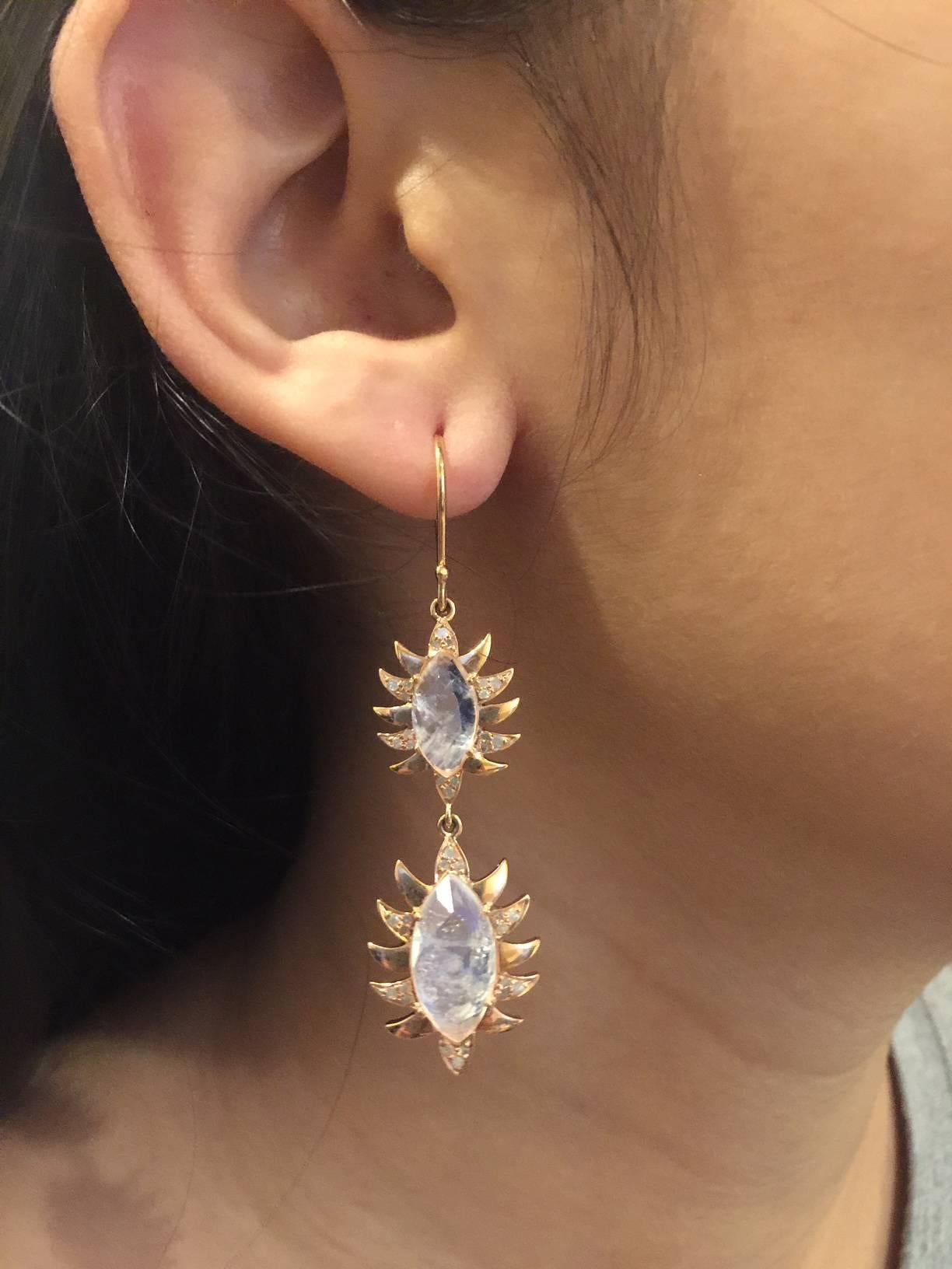 Renowned for its fierce and modern jewelry, Meghna Jewels highlights her signature pave diamond arches in this double drop Claw earrings. These gorgeous drop earrings are handcrafted in 14K gold, sterling silver, .46 ct diamonds and 11.73-carats