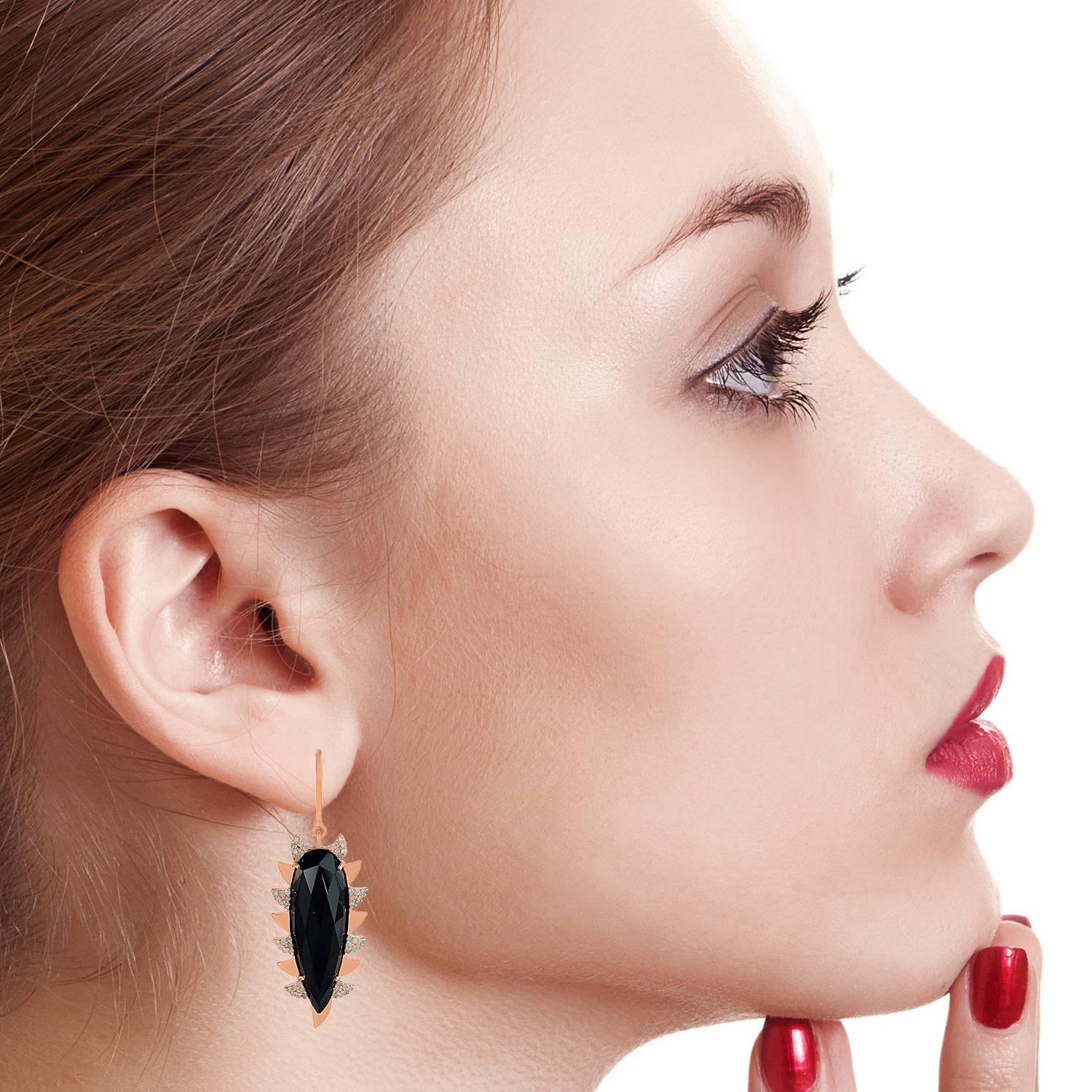 These modern, edgy and fiercely gorgeous drop earrings are handcrafted in 18K gold, sterling silver, 24.84 carat green chalcedony and .68 carat of sparkling diamonds. Exquisitely framed in signature 
