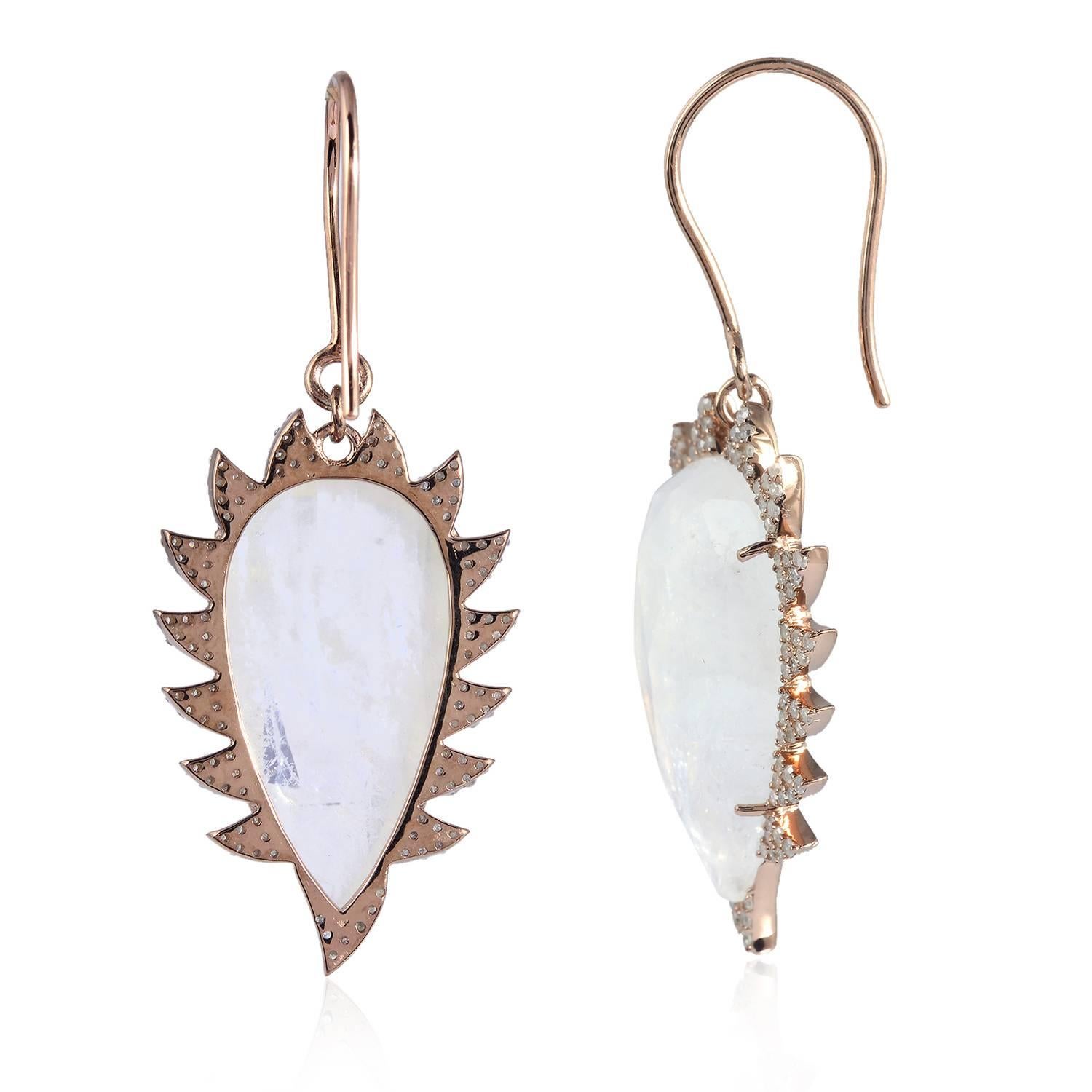 These modern and fiercely gorgeous rose cut rainbow moonstone drop earrings are framed in sparkling signature 