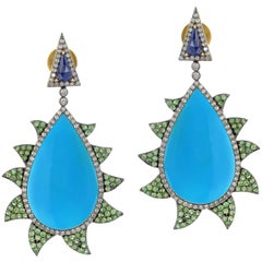 griffe de bijouterie Meghna  Boucles d'oreilles en turquoise, tsavorite, saphir bleu et diamant