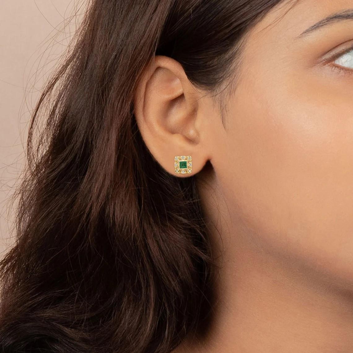 Cast in 14 karat gold, these stud earrings are hand set with .70 carats emerald and .27 carats of glimmering diamonds. 

FOLLOW MEGHNA JEWELS storefront to view the latest collection & exclusive pieces. Meghna Jewels is proudly rated as a Top Seller