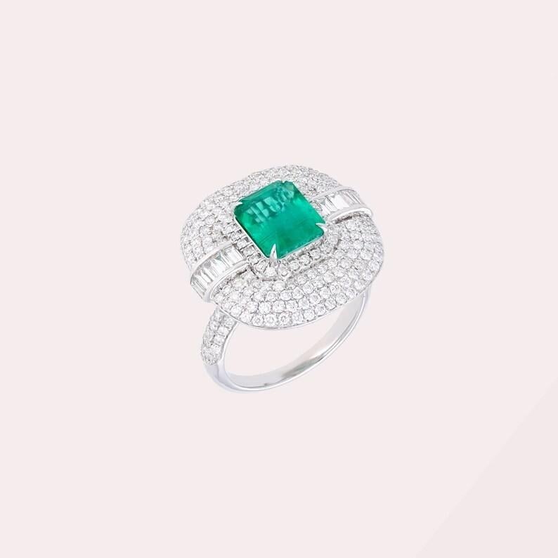 This exquisite ring is crafted from 18-karat gold and intricately set with a 2.33-carat emerald and 1.63 carats of sparkling diamonds.

FOLLOW MEGHNA JEWELS storefront to view the latest collection & exclusive pieces. Meghna Jewels is proudly rated