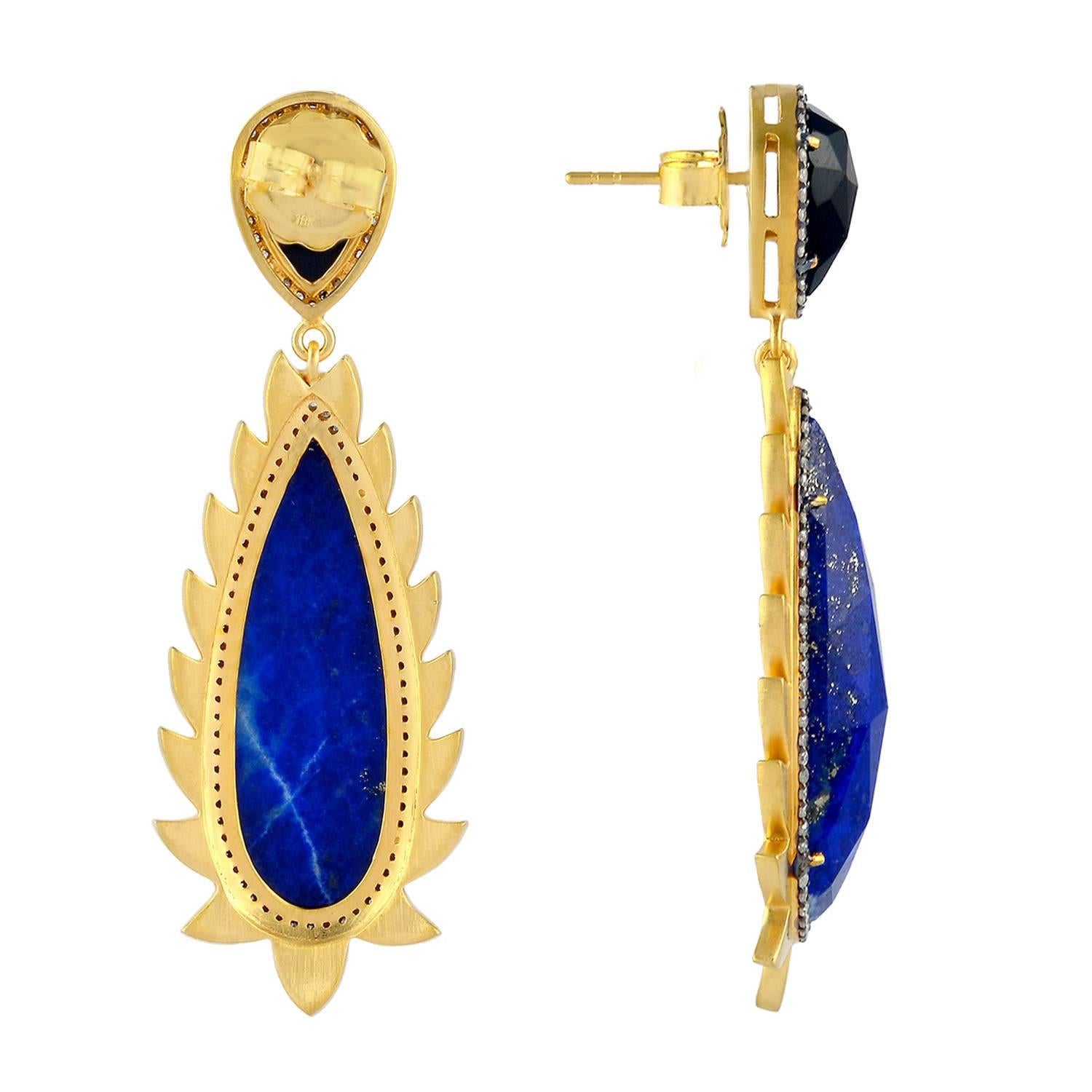 These modern and fiercely gorgeous drop earrings are handcrafted in 14K gold, sterling silver, 33.0 carat Lapis, 6.20 carat Black Onyx and 1.32 carat of sparkling diamonds . Exquisitely framed in signature 