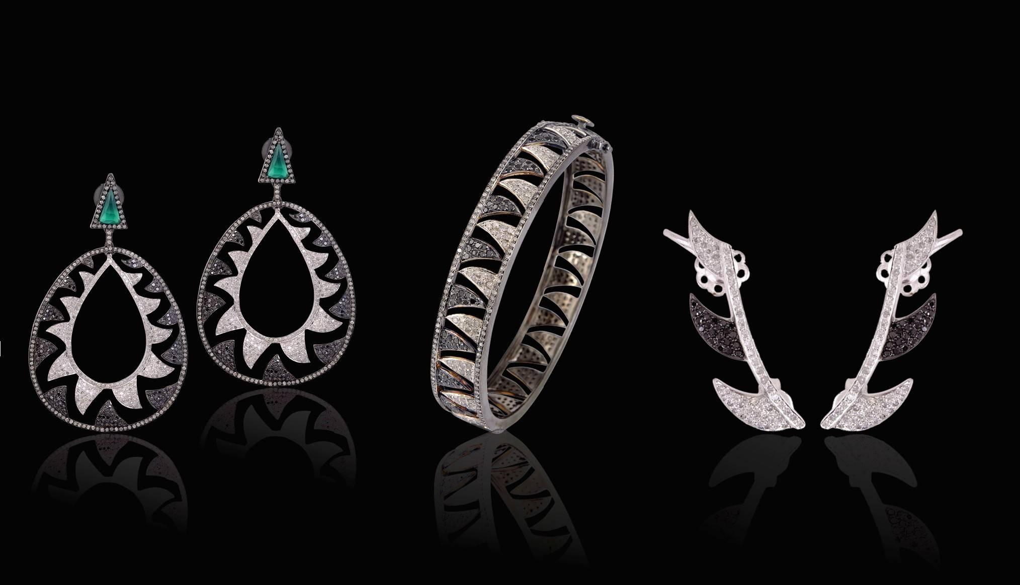 Women's Interlocking Claw 6.22 Black White Diamond Earrings  For Sale