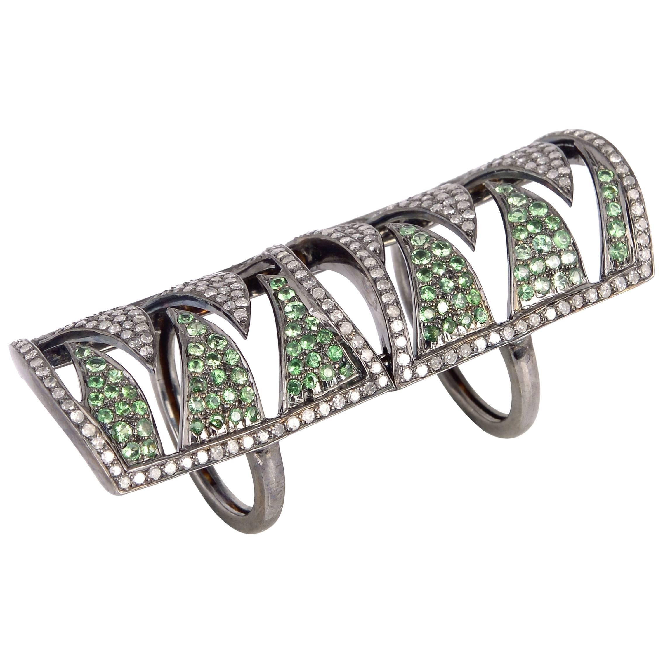 Anillo con garras entrelazadas de diamantes Tsavorita