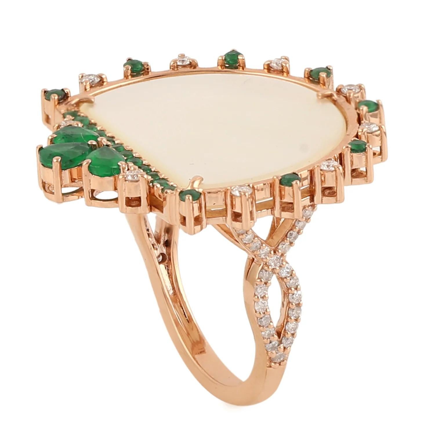 This ring has been meticulously crafted from 14-karat gold.  It is hand set with 7.93 carats mother of pearl, .80 carats emerald & .38 carats of sparkling diamonds. Also available matching earrings.

FOLLOW MEGHNA JEWELS storefront to view the