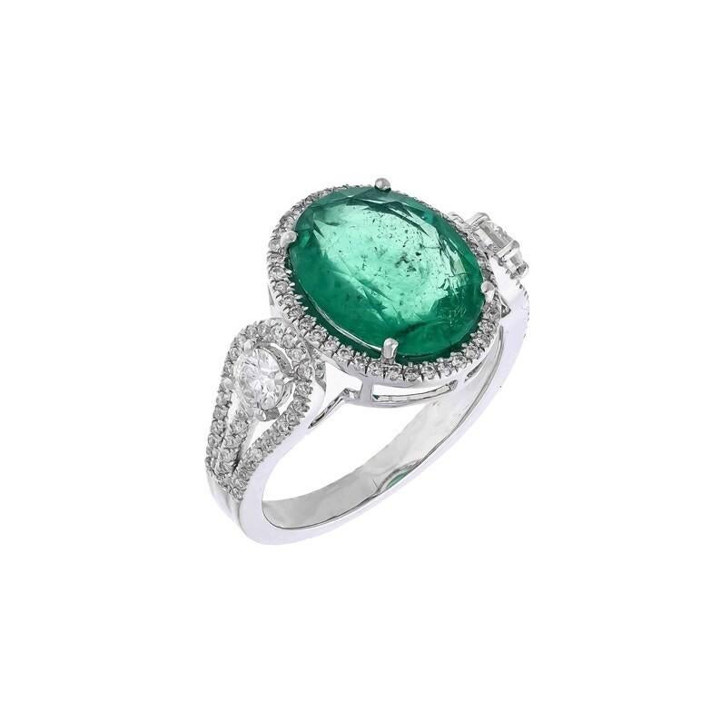 This stunning ring has been crafted from 18-karat gold. It is hand set with 3.4 carats emerald and .59 carats of sparkling diamonds. 

The ring is a size 7 and may be resized to larger or smaller upon request. FOLLOW MEGHNA JEWELS storefront to view