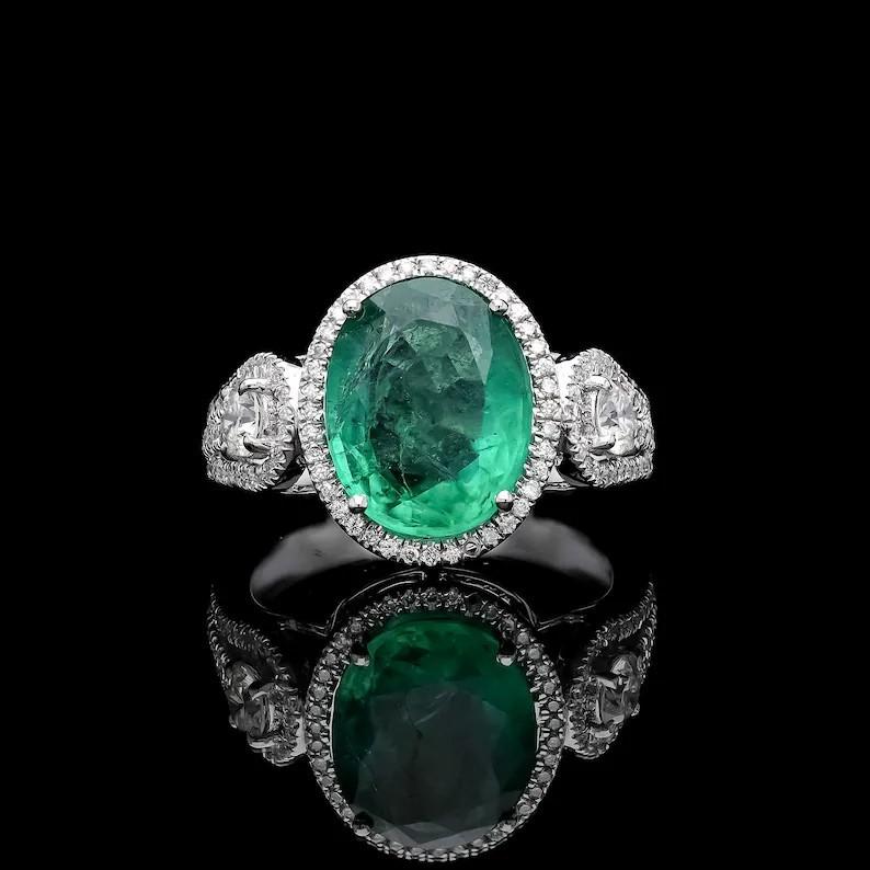 Contemporary Meghna Jewels Oval Cut Emerald Three Stone Diamond 18K White Gold Ring For Sale