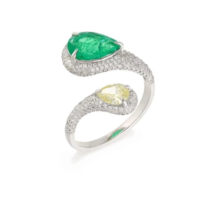 This stunning ring has been crafted from 18-karat gold. It is hand set with 1.42 carats emerald and .76 carats of sparkling diamonds. 

The ring is a size 7 and may be resized to larger or smaller upon request. FOLLOW MEGHNA JEWELS storefront to