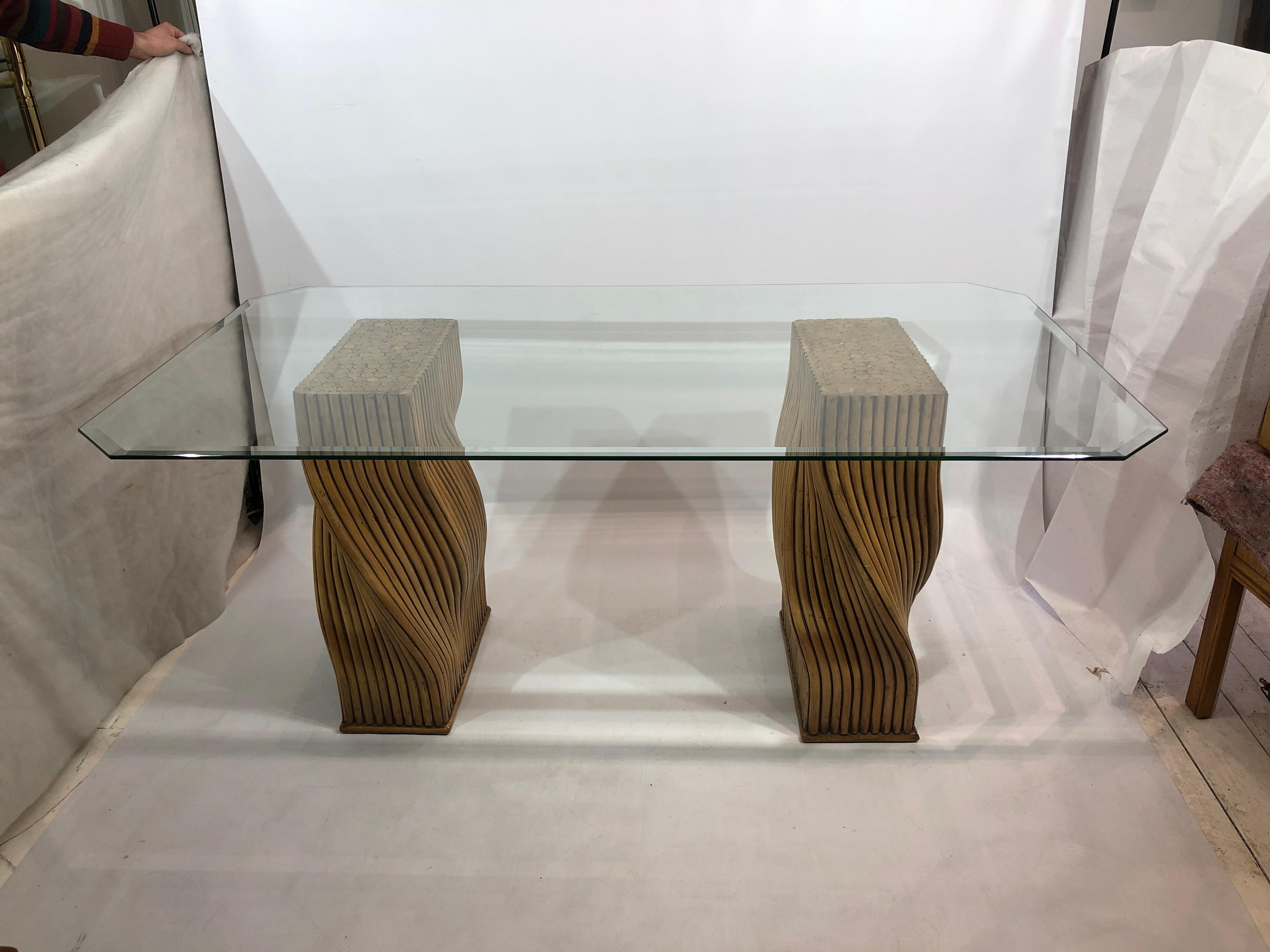 An iconic design from the 1970s, originally designed by Arthur Edwards for Mehitabel Philippines and distributed widely by John McGuire. Original label on the base.
Two table bases, twisted pedestals, support the rectangular octagonal bevelled glass