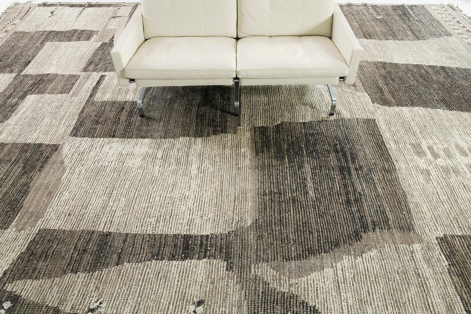 Akal rug is a handwoven wool piece inspired by Scandinavian design elements for the modern design world. The rug's shag balance and harmony, handwoven with neutral shades of taupe and beige pile weave. This collection, Mehraban's Atlas collection is