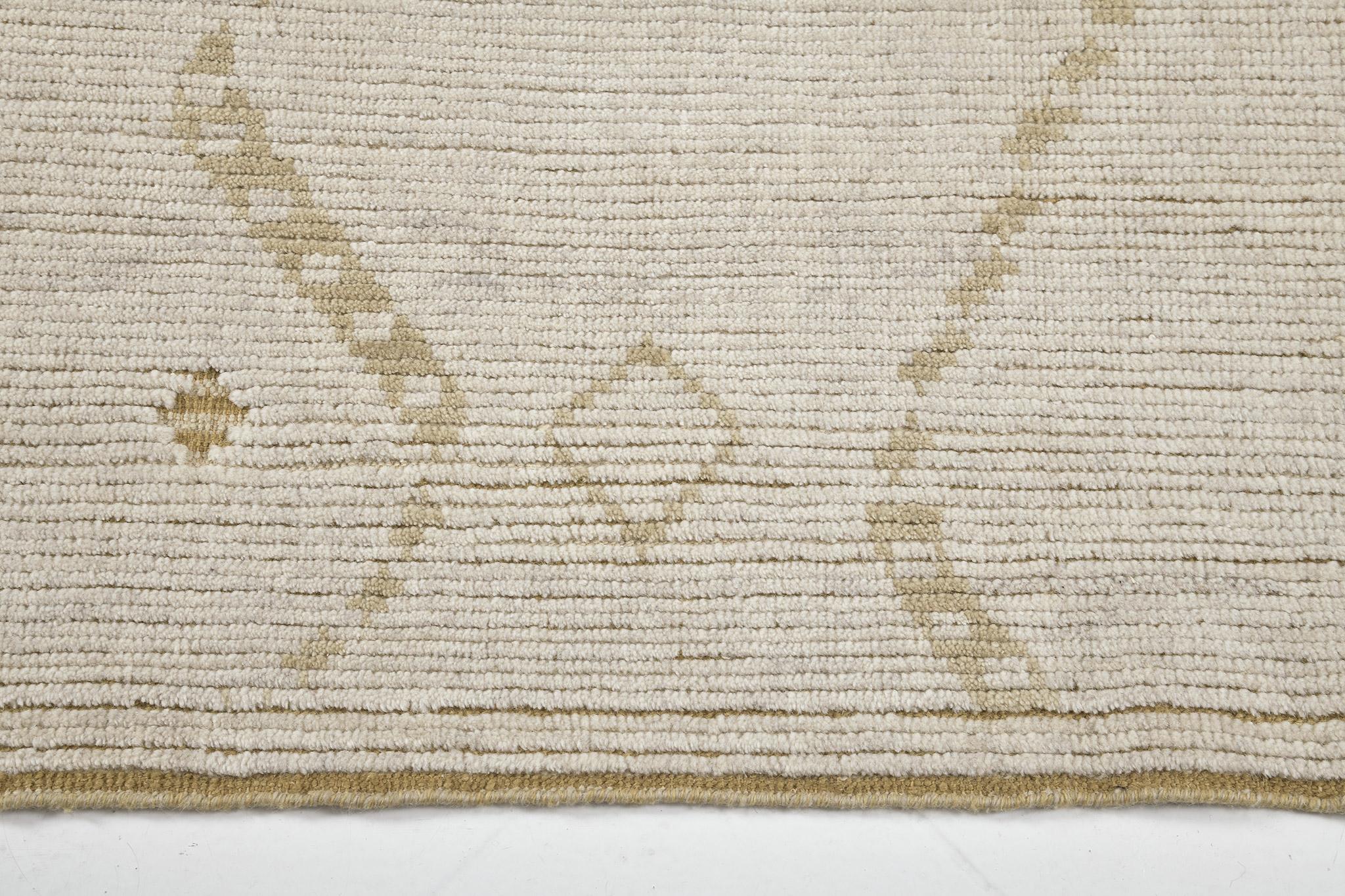 Albarino in Estancia collection features an all over aesthetic pattern in bone and light fawn. Lozenge patterns are featured in this mesmerizing rug representing The Eye in ancient Berber motifs that wards off the evil eye. Classy yet sophisticated,
