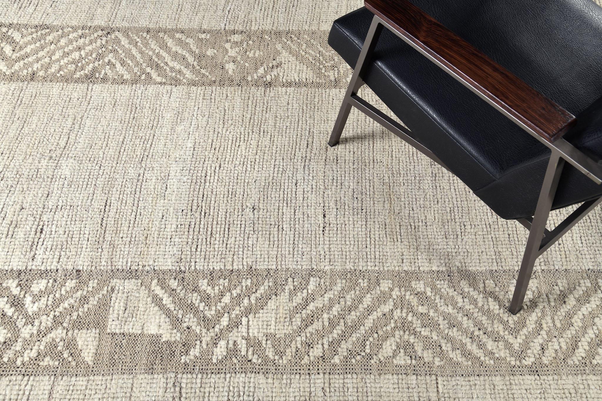 Abrolhos is a handwoven luxurious wool rug with timeless embossed detailing. In addition to its perfect brown flatweave, Albrohos has a beautiful shag that brings a lustrous texture and contemporary feel to one's space. The Haute Bohemian collection