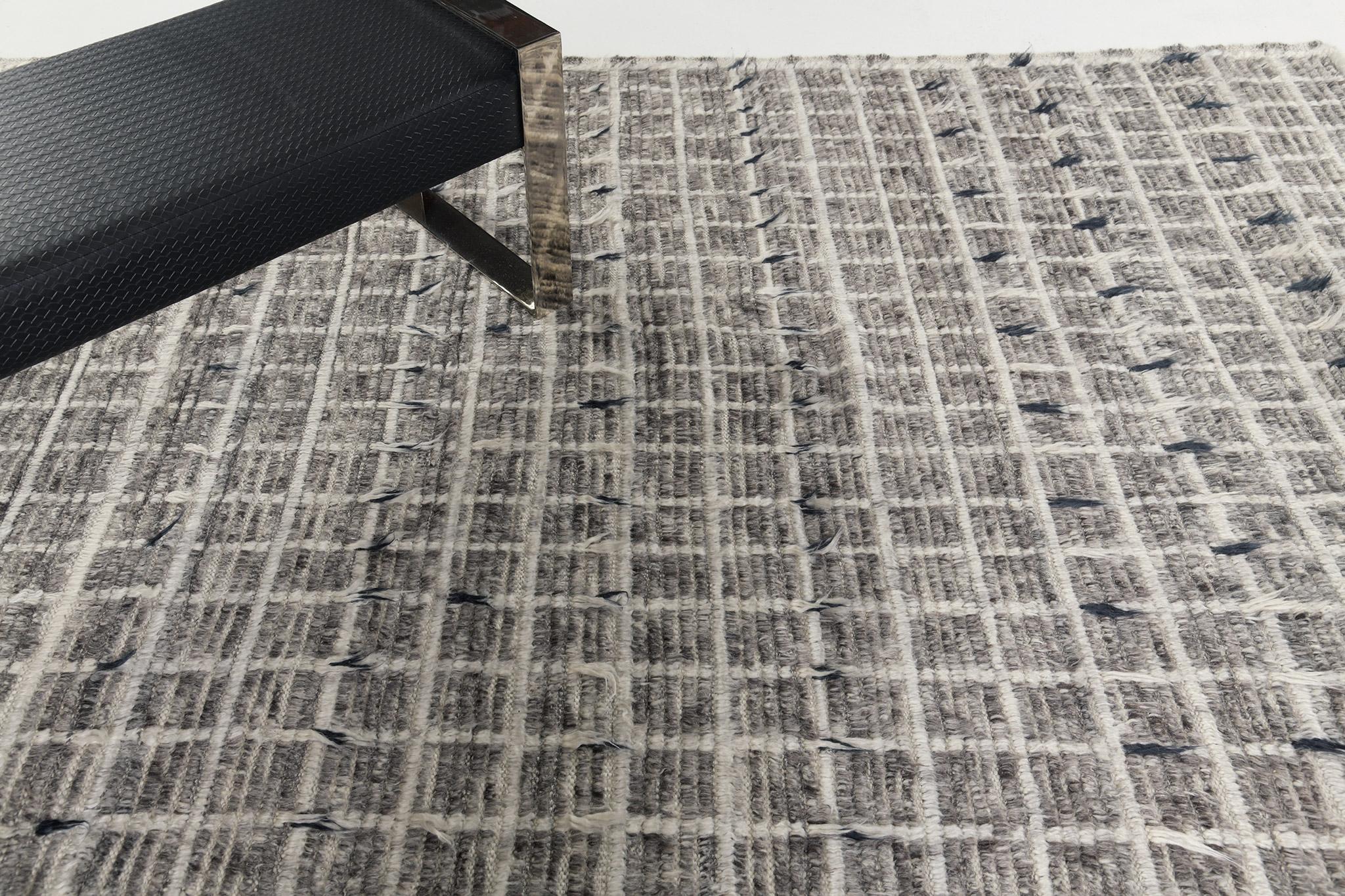 Amihan is a detailed pile weave from our Atlas Collection. The delicate checkered and ribbed style rug with ash gray moods gives a pleased and delightful aura. Repeating ash pile detailing also brings a straightforward and extraordinary uniqueness