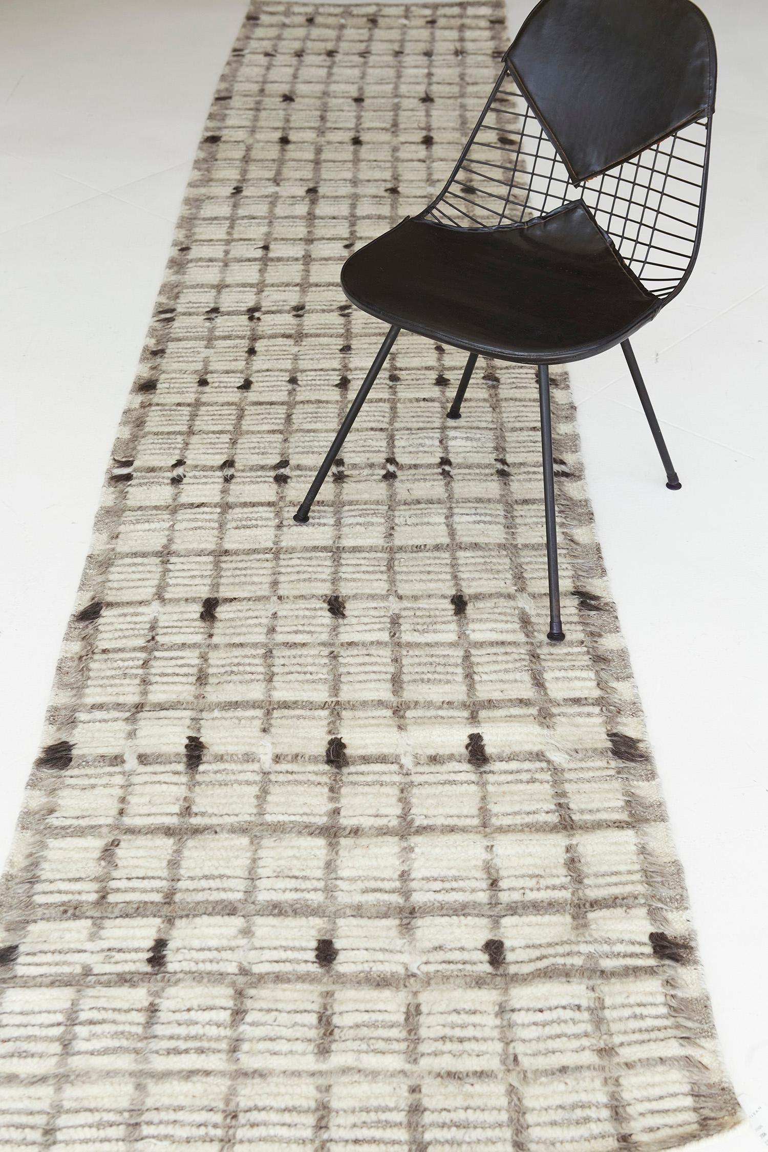 Amihan is a beautifully detailed pile weave from our Atlas Collection. The delicate checkered and ribbed style rug with ash gray tones gives a rich and charming feel. Repeating ash pile detailing also brings a bold and noteworthy uniqueness to this