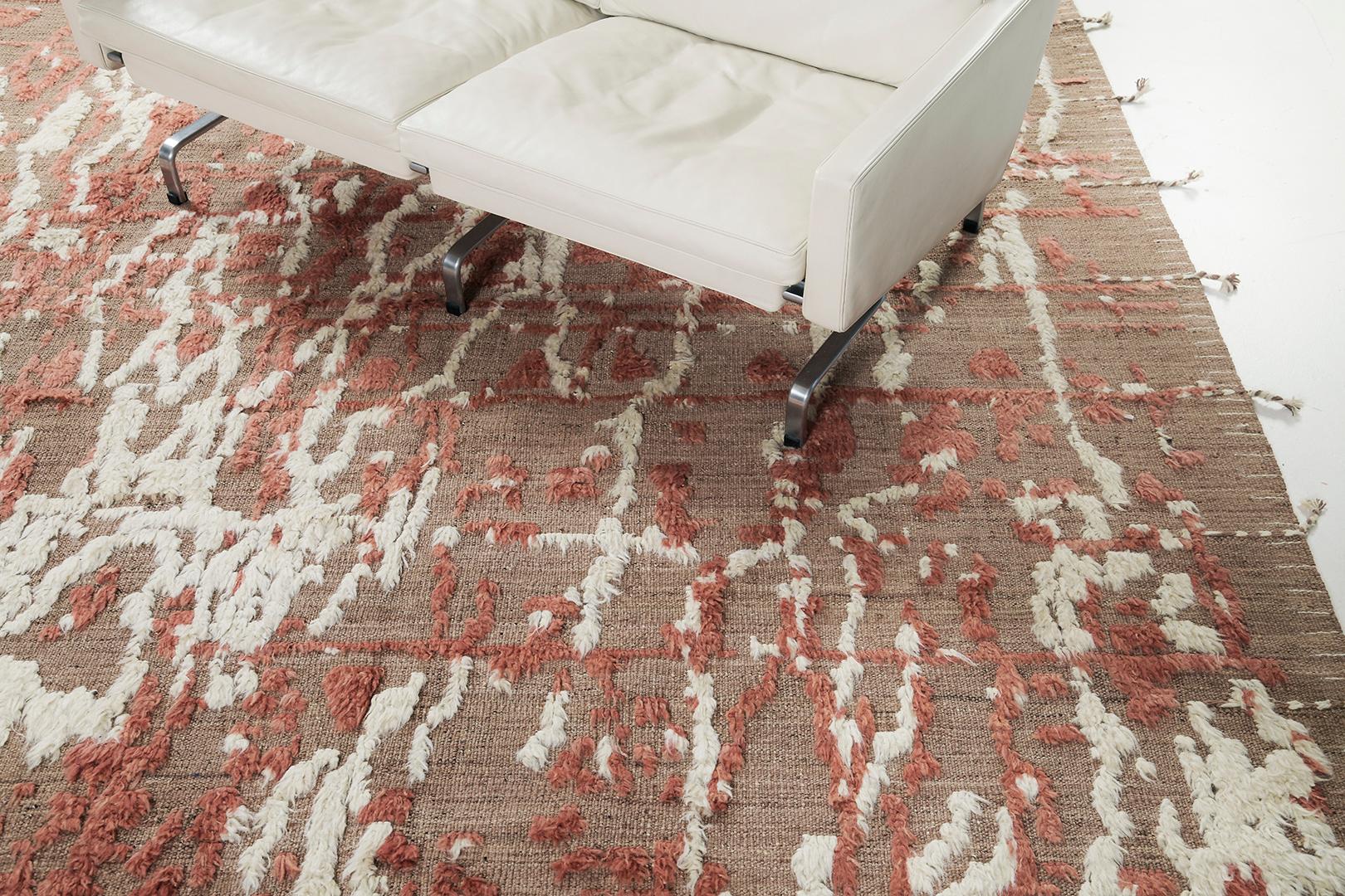 Amin’ is a vibrant plush rug in the stunning shades of khaki, coral and white. Irregular strokes brings out the character of this bewildering masterful rug. Mehraban's Atlas collection is noted for its saturated color, intuitive motifs, and