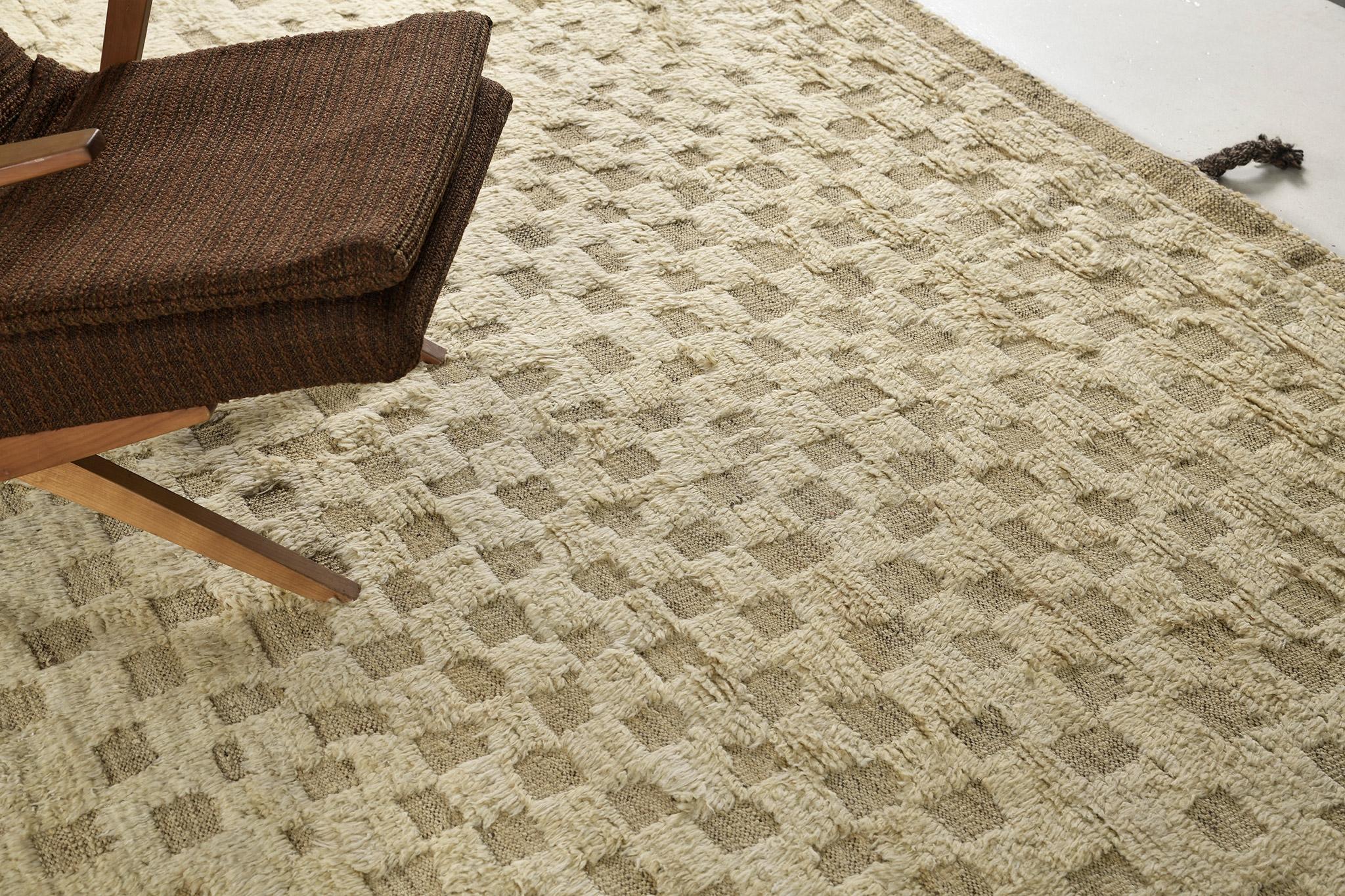 Anaruz ist ein Flor aus gewebter Wolle, der durch die Farbtöne Tortilla und Kaffee ein modern-zeitgenössisches Design aufweist. Mit seinem begehrten, brillanten und einzigartigen Stil ist dieses Meisterwerk die Traumkollektion eines jeden. Die