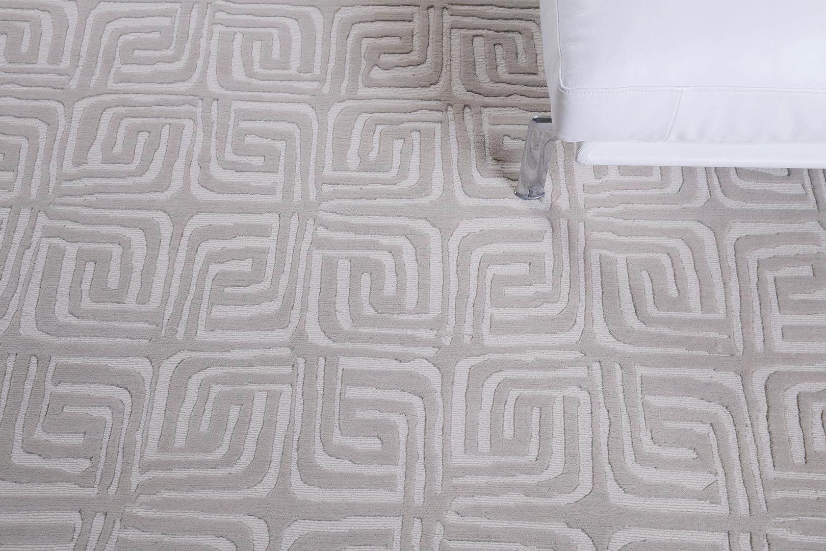 Interlaced maze repeat of tonal wool loop and pile. Aniki rug brings a fresh take on concretist bas relief in tonal ivory.

Rug Number
29754
Size
9' 2