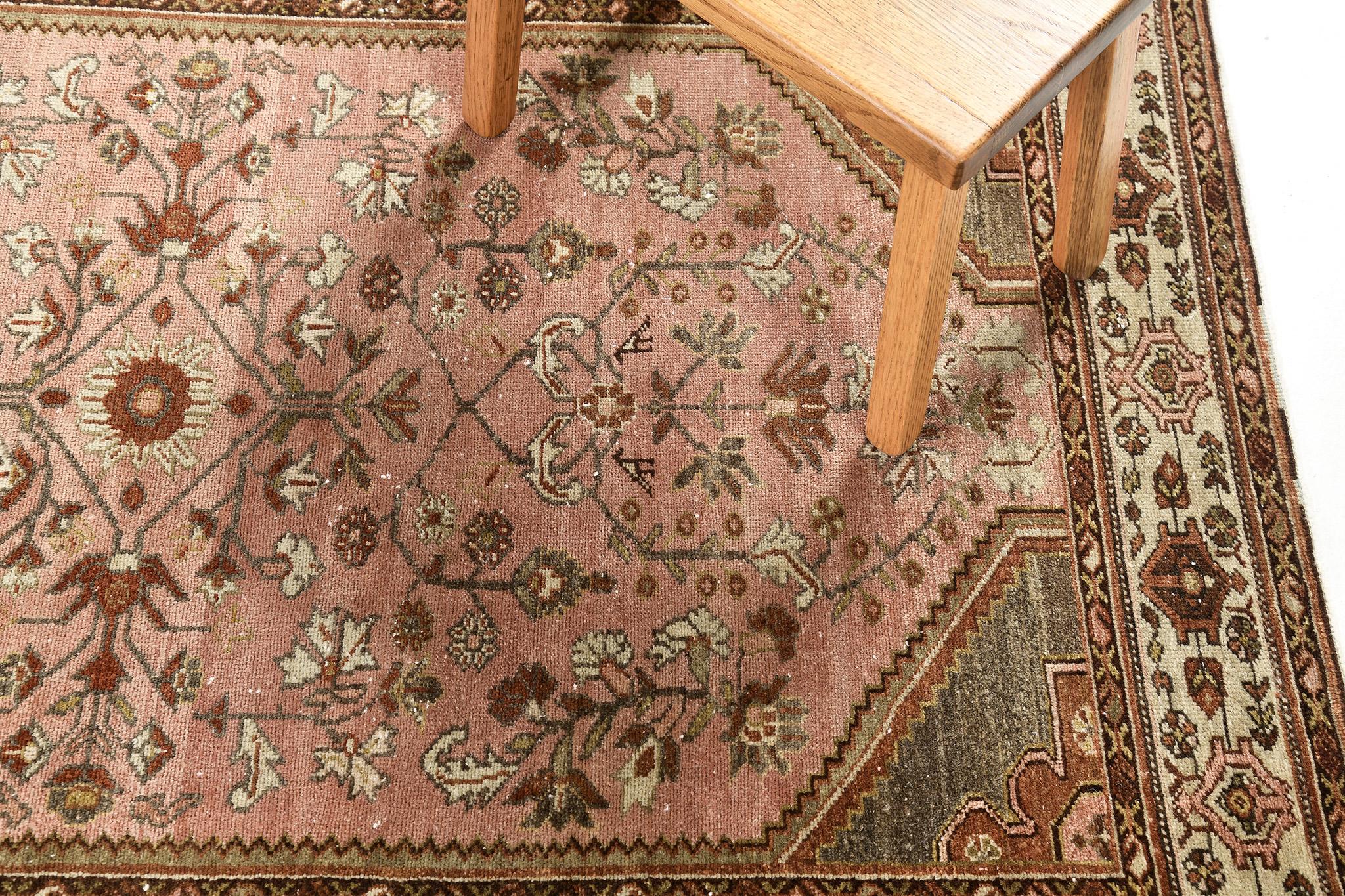 A gracefully composed Antique Persian Malayer rug that is a majestic illustration of class, soft beauty and serenity. Distinctive Herati motifs, palmettes, stylized florals, serrated leaves and florid patterns are showcasing captivating