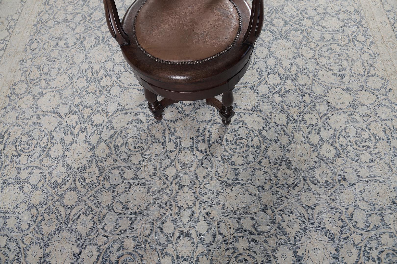 This delicate and stylish Kerman rug incorporates the borders that reflect the intricacy and colors that can be seen in the field of all-over spiral foliage and elegant florets. This results in a wonderfully harmonious look and feel. Earthy-tone