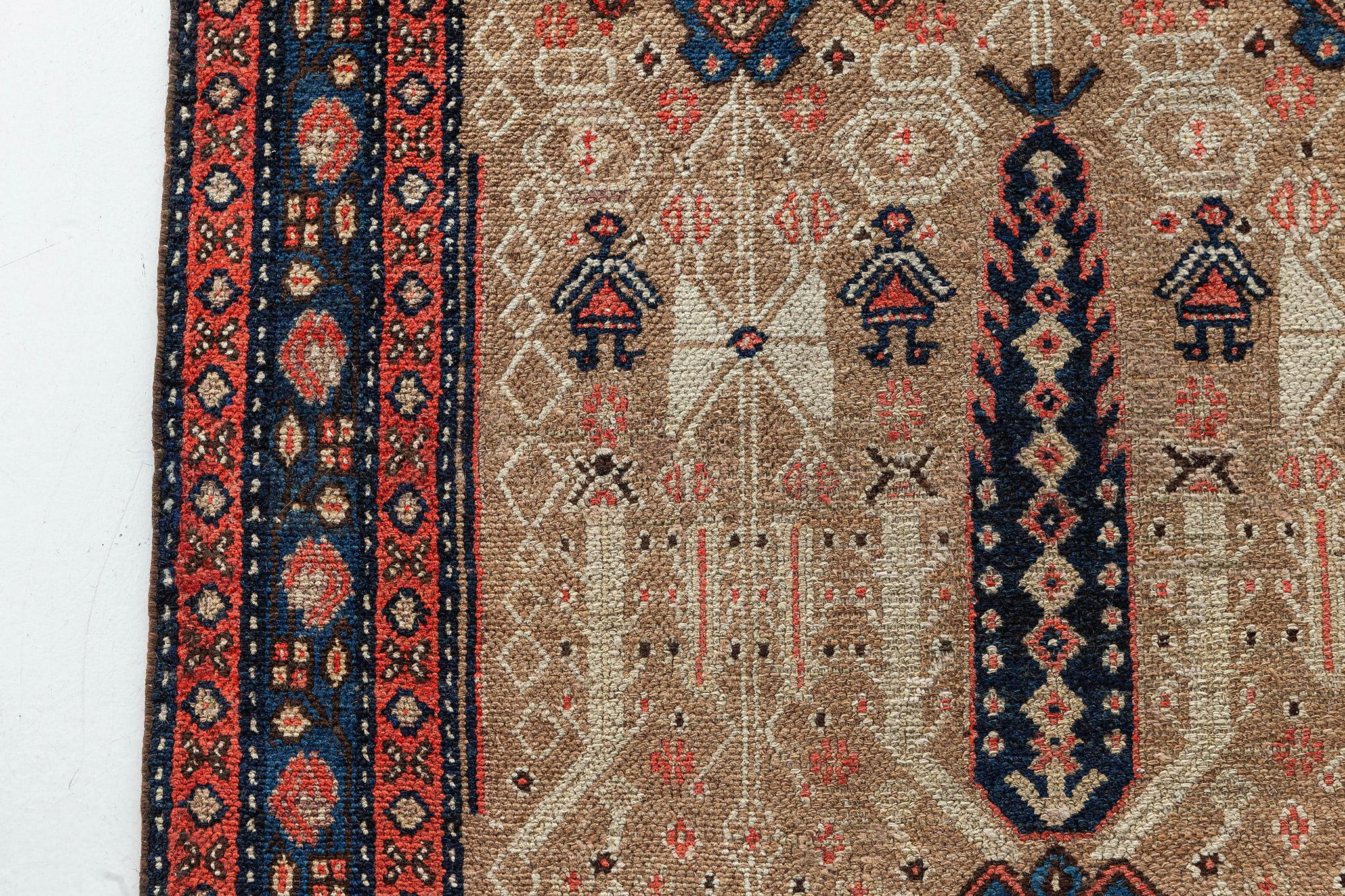 A fascinating antique Persian Sarab runner that appears to have a brilliant graphic amorphous motifs that complemented to form a sublime and majestic impact. Rendered in stunning variegated colour palette, this exquisite rug tells a story from each