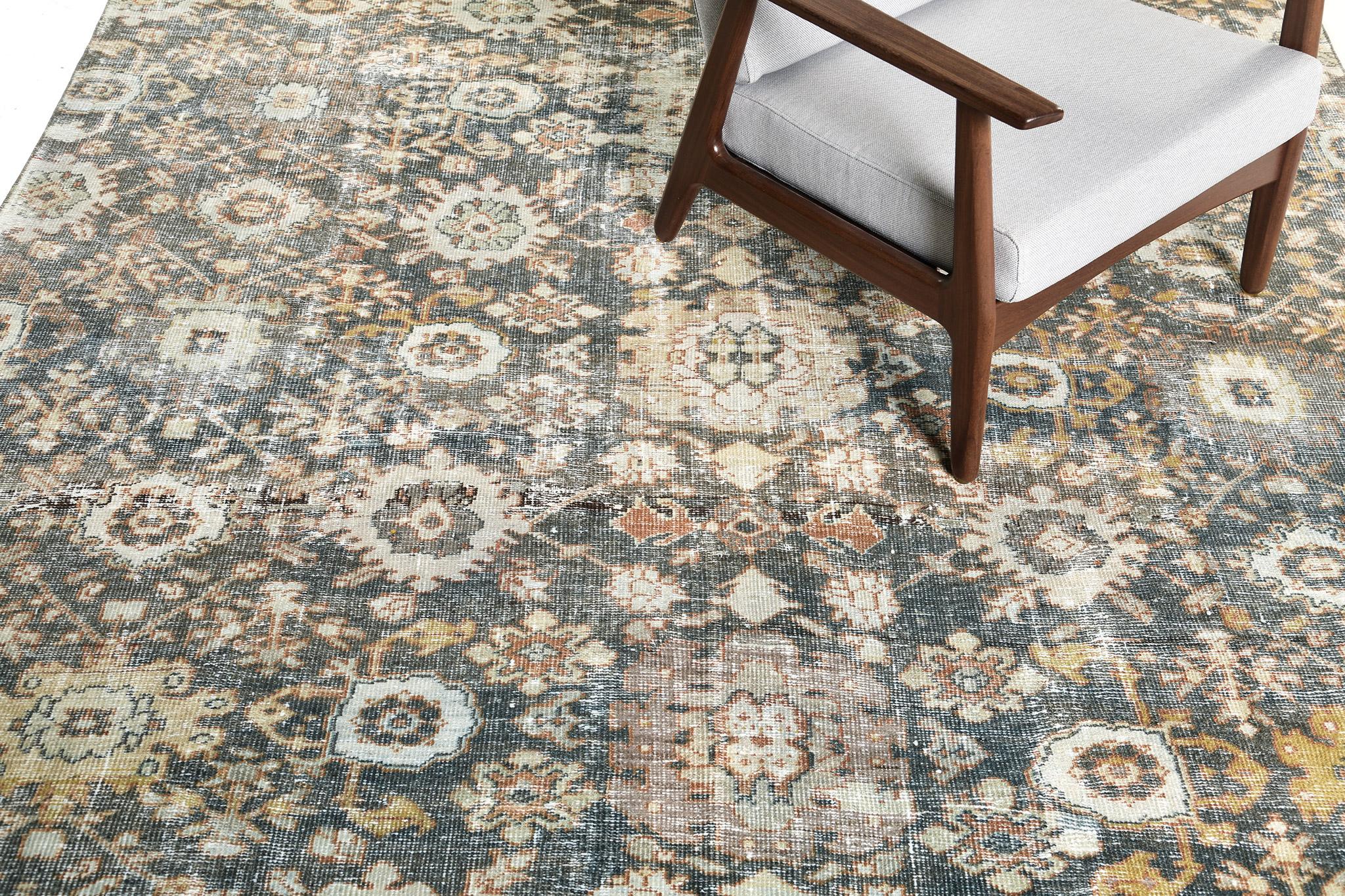The conventional sensations given by this delicate rug features neutral-toned ornaments and motifs in an interplay of teal and raven fields enclosed by an alternating floral border. An outstanding rug in Sultanabad design that will amplify your room