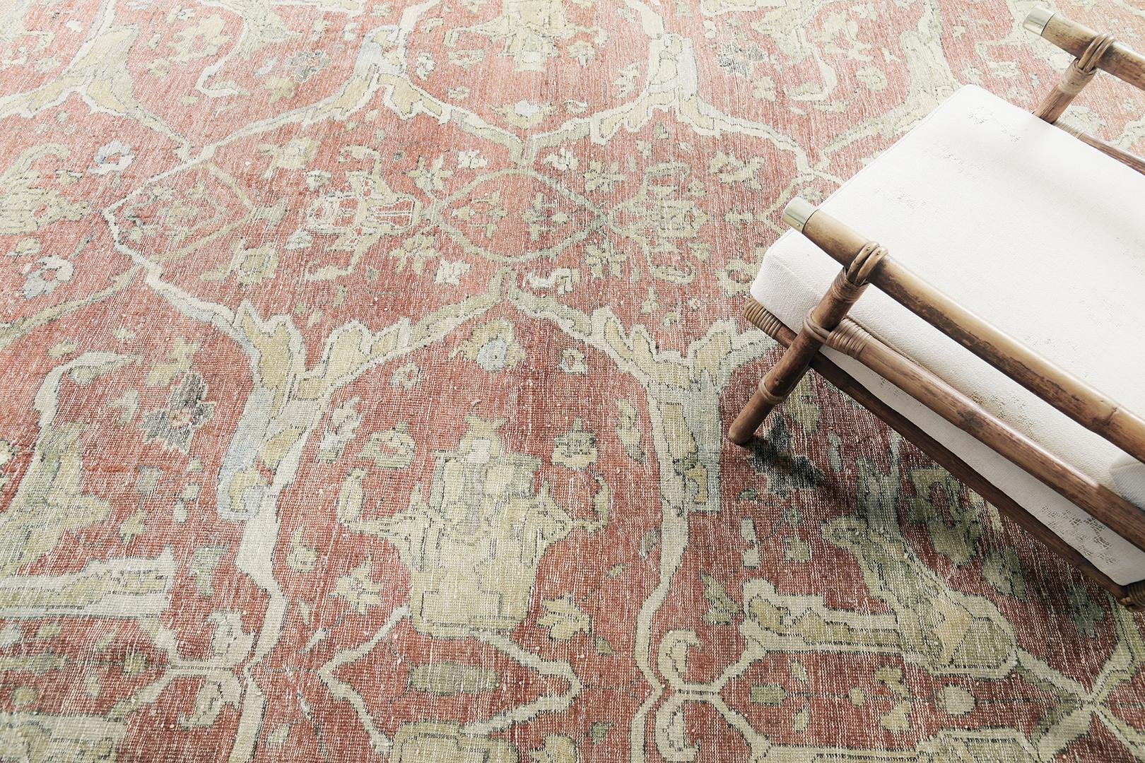 A stylish Sultanabad design revival rug that is seamlessly woven with all-over botanical patterns in the amazing tones of gray, camel and sand. This sophisticated rug allures with ease and beautifully express timeless rustic style. With its