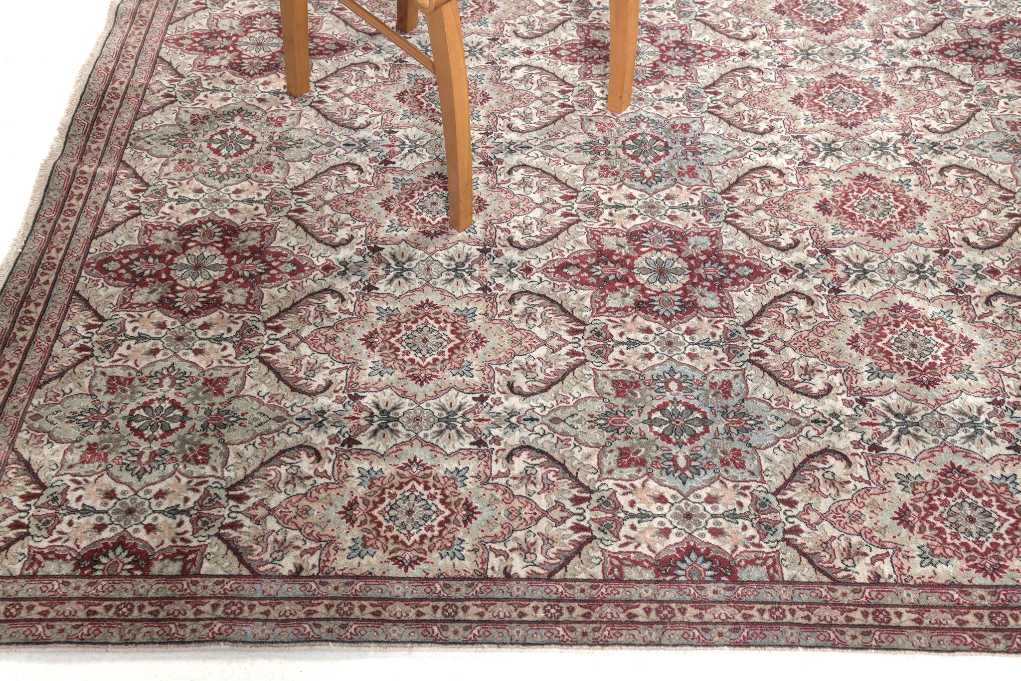 With its classy beauty and sophisticated vibe, this Antique Turkish Sivas rug features an all-over florid elements of rosettes, sprigs, blooming palmettes, and arabesque vinery. Highlighting the majestic tones of elegant colour scheme composed of
