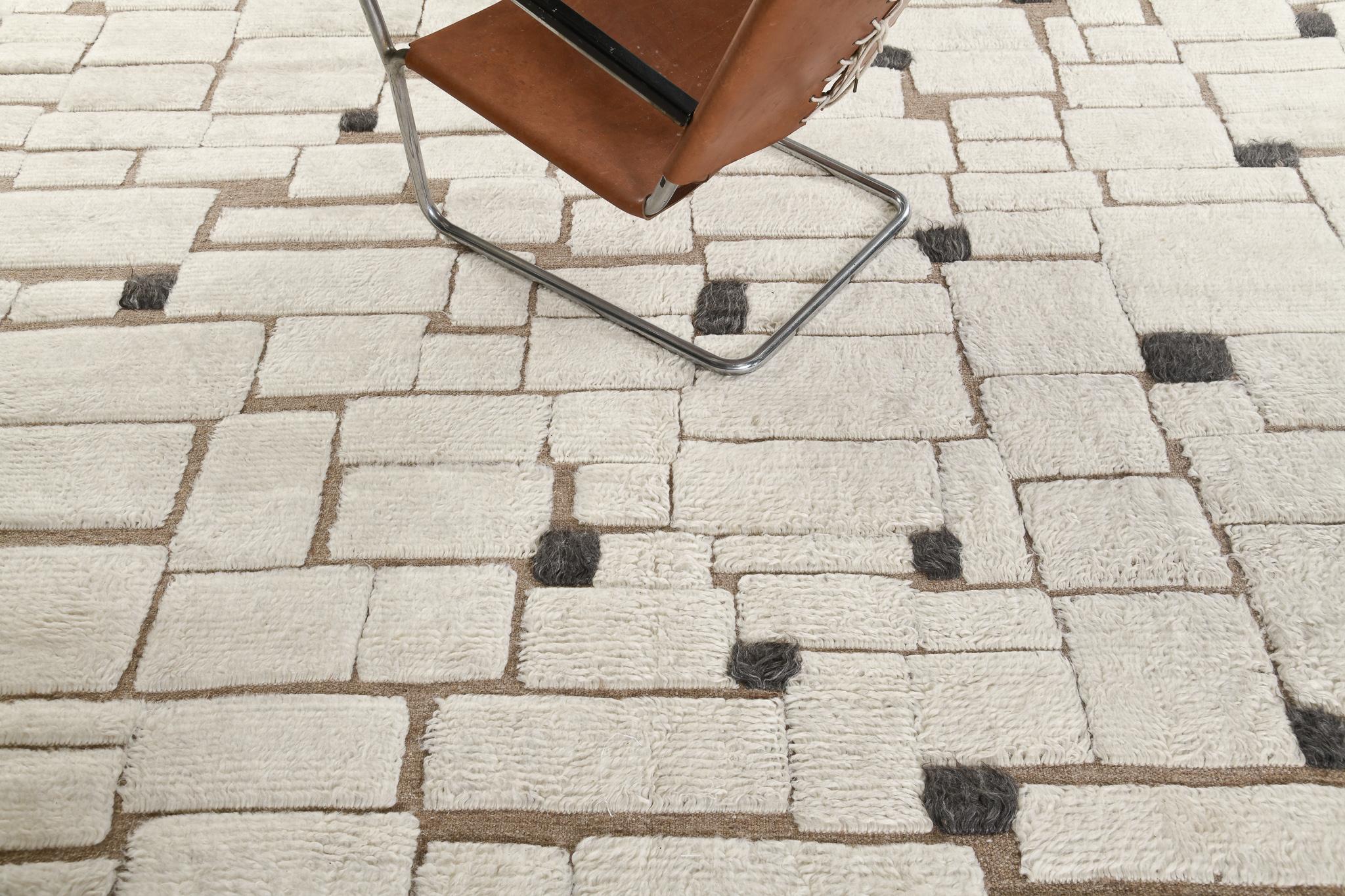 Avocet has gorgeous wool that features a mocha, ivory and gray embossed rectangular that gives your home a stylish charm. The playfulness of this masterpiece makes you feel creative in every color scheme. Sandpiper collection designed in Los Angeles