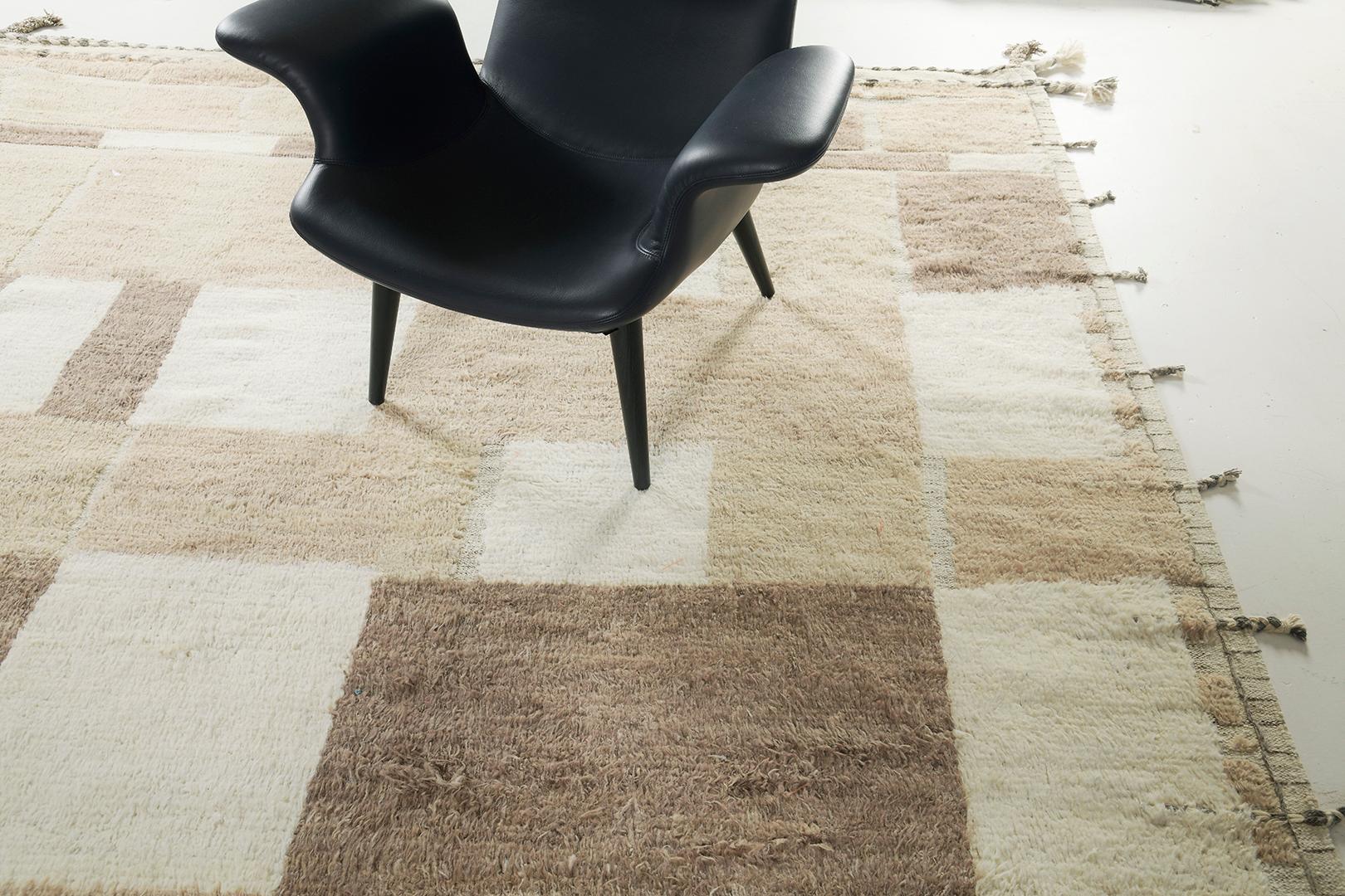 Fascinating and remarkably elegant, Awlegh rug from Atlas Collection displays varieties of angular shapes that stack together creating a captivating effect featured on a combination of earthy neutral tones. Spread artistically along the beige field,